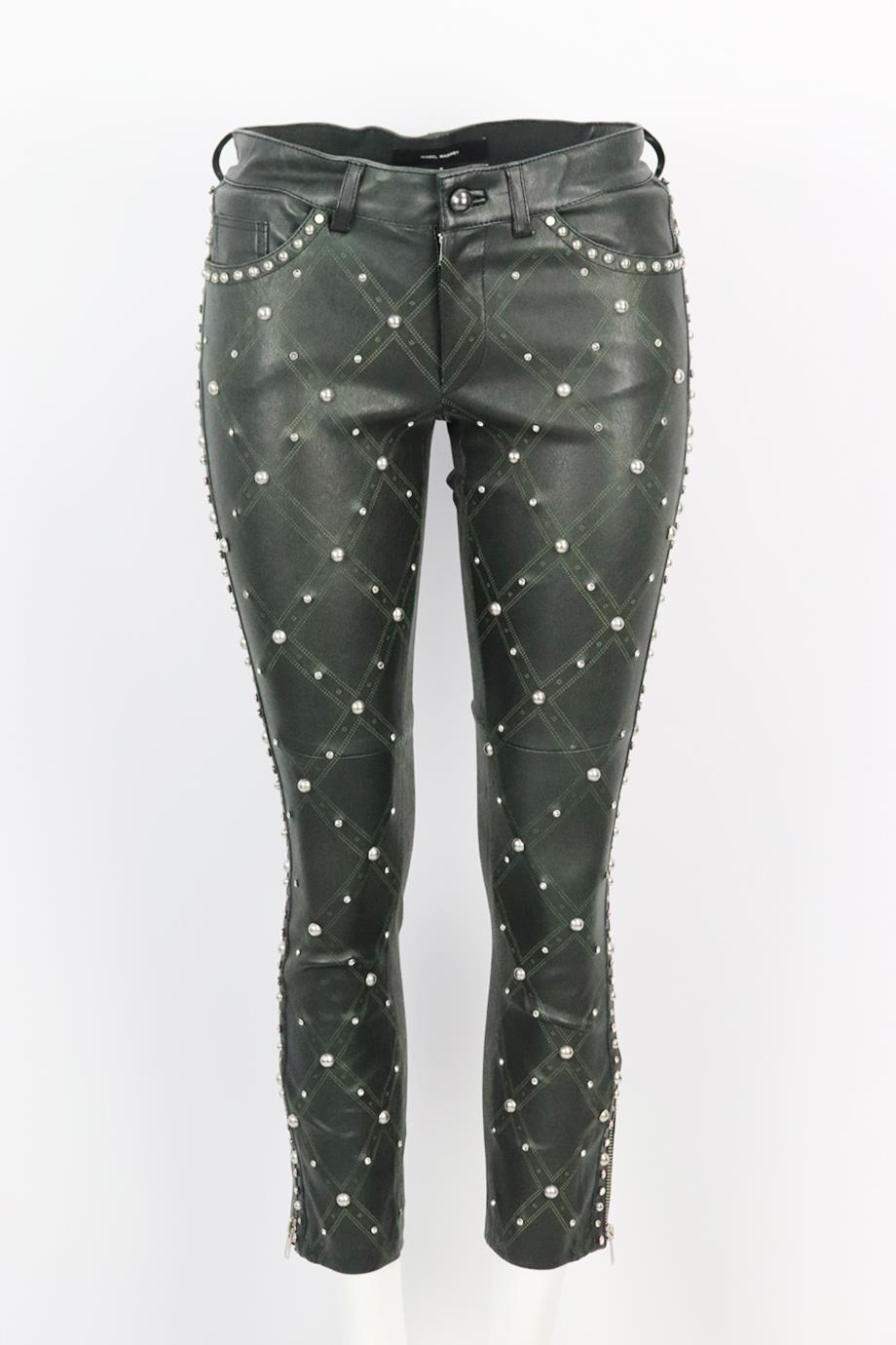 Isabel Marant studded stretch leather skinny pants. Green. Button and zip fastening at front. 100% Lambskin; fabric2: 97% cotton, 3% elastane; lining: 100% cotton. Size: FR 36 (UK 8, US 4, IT 40). Waist: 31 in. Hips: 36 in. Length: 33 in. Inseam: