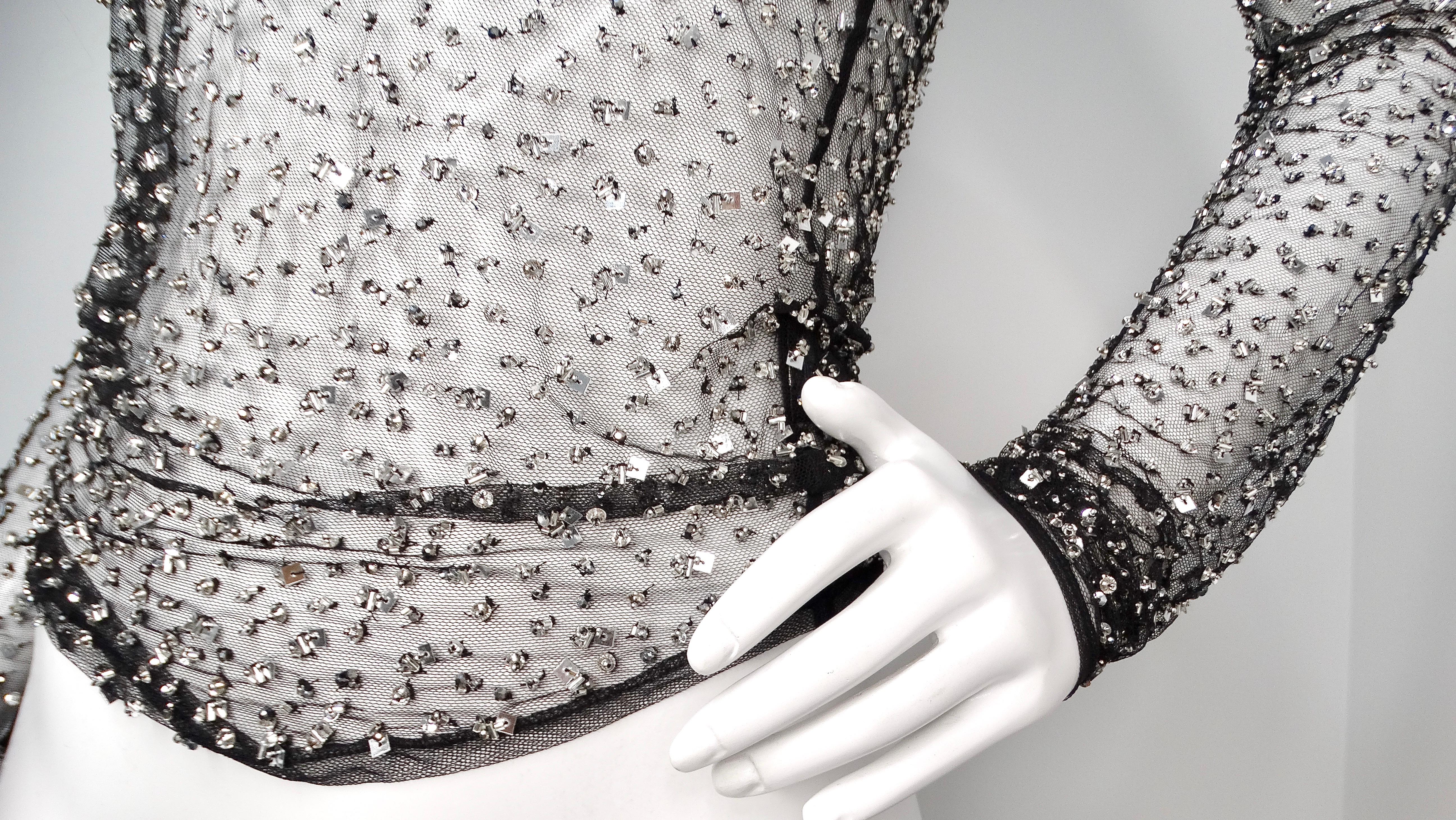 Donna Isabel Marant Todiz - Top nero a maniche lunghe con paillettes trasparenti in vendita
