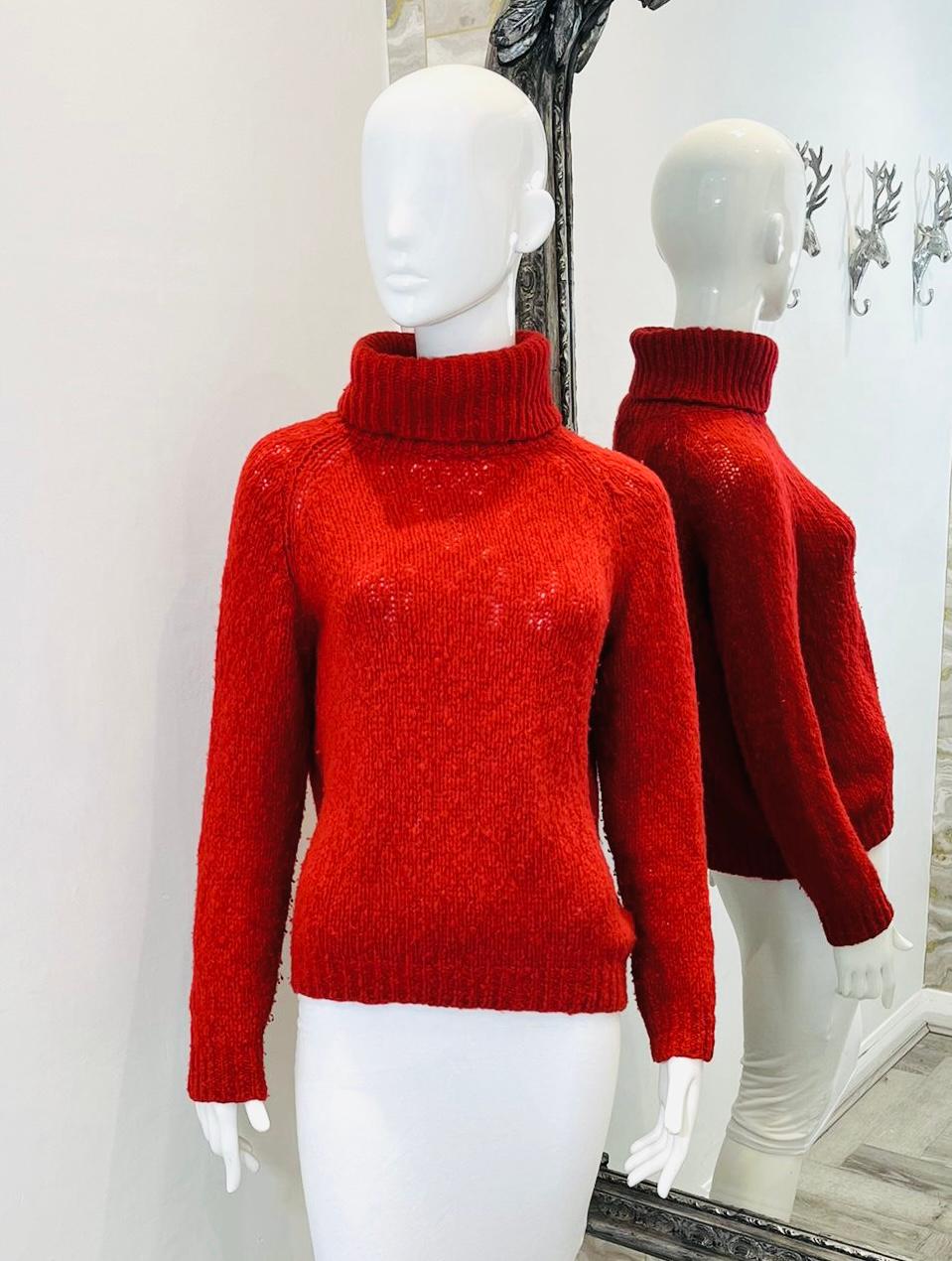 Isabel Marant Virgin Wool & Angora Roll Neck Jumper

Bright red knitwear designed with chunky roll neck and long sleeves.

Featuring regular fit, ribbed cuffs and hem.

Size – 3 - L

Condition – Very Good

Composition – 60% Virgin Wool, 30%