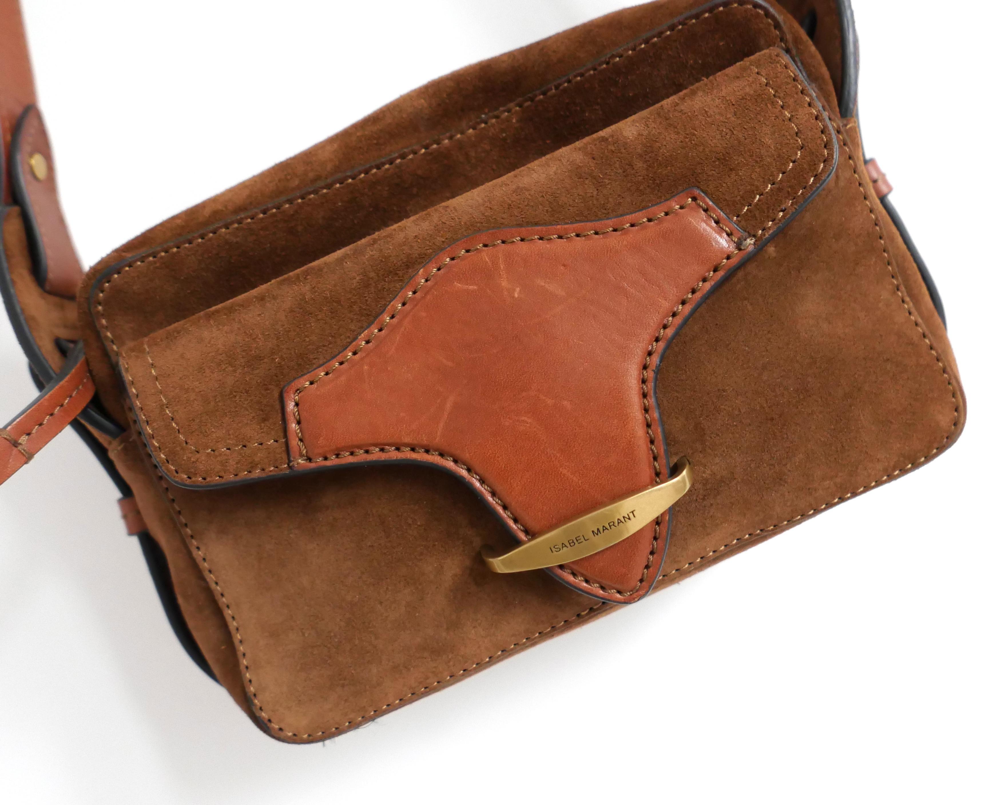 Sac à bandoulière Easy chic Isabel Marant Wasy - utilisé moins d'une poignée de fois mais présentant quelques éraflures sur le rabat avant. Fabriqué en daim de couleur cognac avec des détails en cuir marron. Il est doté d'une poche frontale