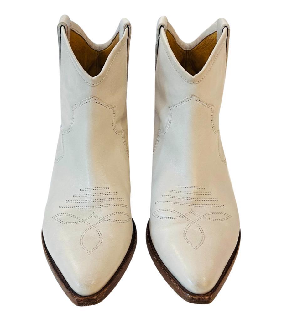 Isabel Marant Western Canvas & Suede Ankle Boots
Ivory 'Demar' boots styled with perforated detailing to the front and rear.
Featuring pointed toe and pull-on design. Rrp Approx. £595
Size – 37
Condition – Fair/Good (General signs of wear, some