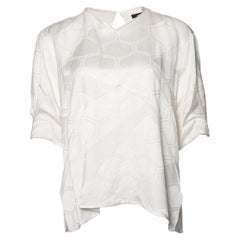 Isabel Marant, blusa blanca con estampado gráfico