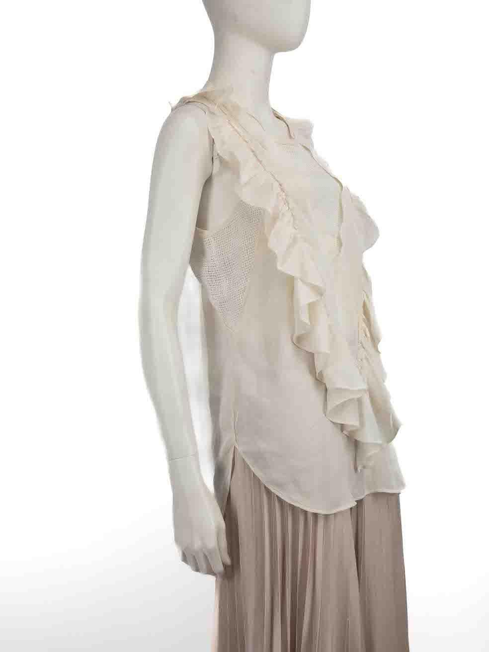 CONDITION is Good. Minor wear to top is evident. Light wear to the weave with some plucks and pulls seen throughout, particularly on the raw edge detailing of this used Isabel Marant designer resale item.
 
 Details
 White
 Cotton
 Top
 Sleeveless
