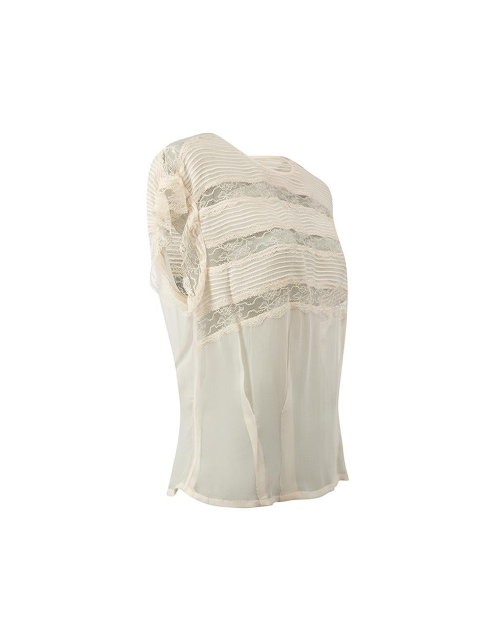 CONDITION is Very good. Minimal wear to top is evident. There is a stain just under the neckline on this used Isabel Marant designer resale item. 



Details


Cream

Silk

Short sleeves blouse

Lace panelled

Back button up closure





Made in