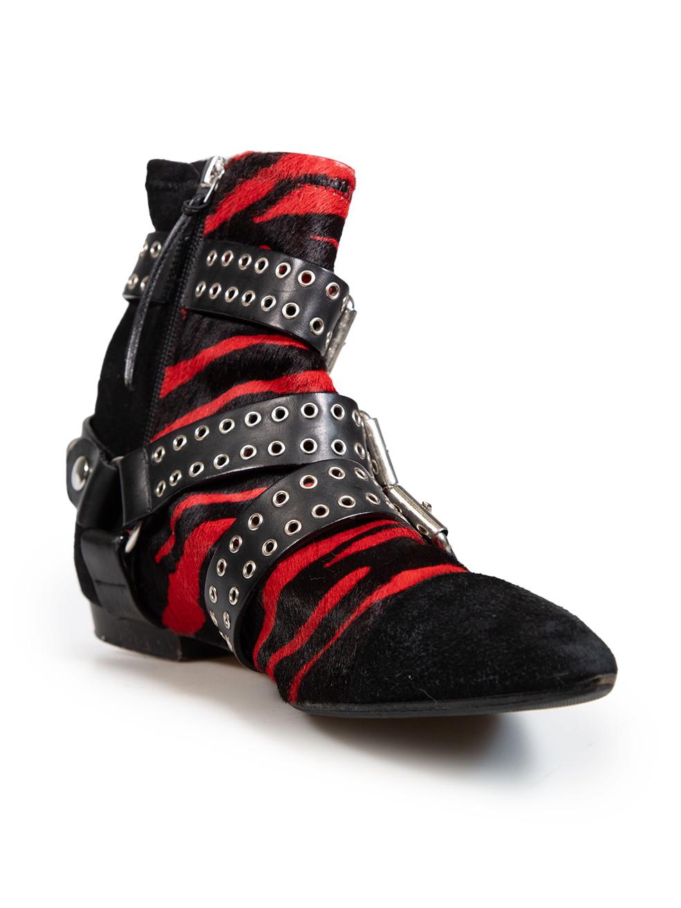 CONDITION is Good. General wear to boots is evident. There are abrasions and discolouration across toe boxes and toe tips. There are more abrasions and wear down of material along ankle collars. Slight discolouration along leather details. Boots