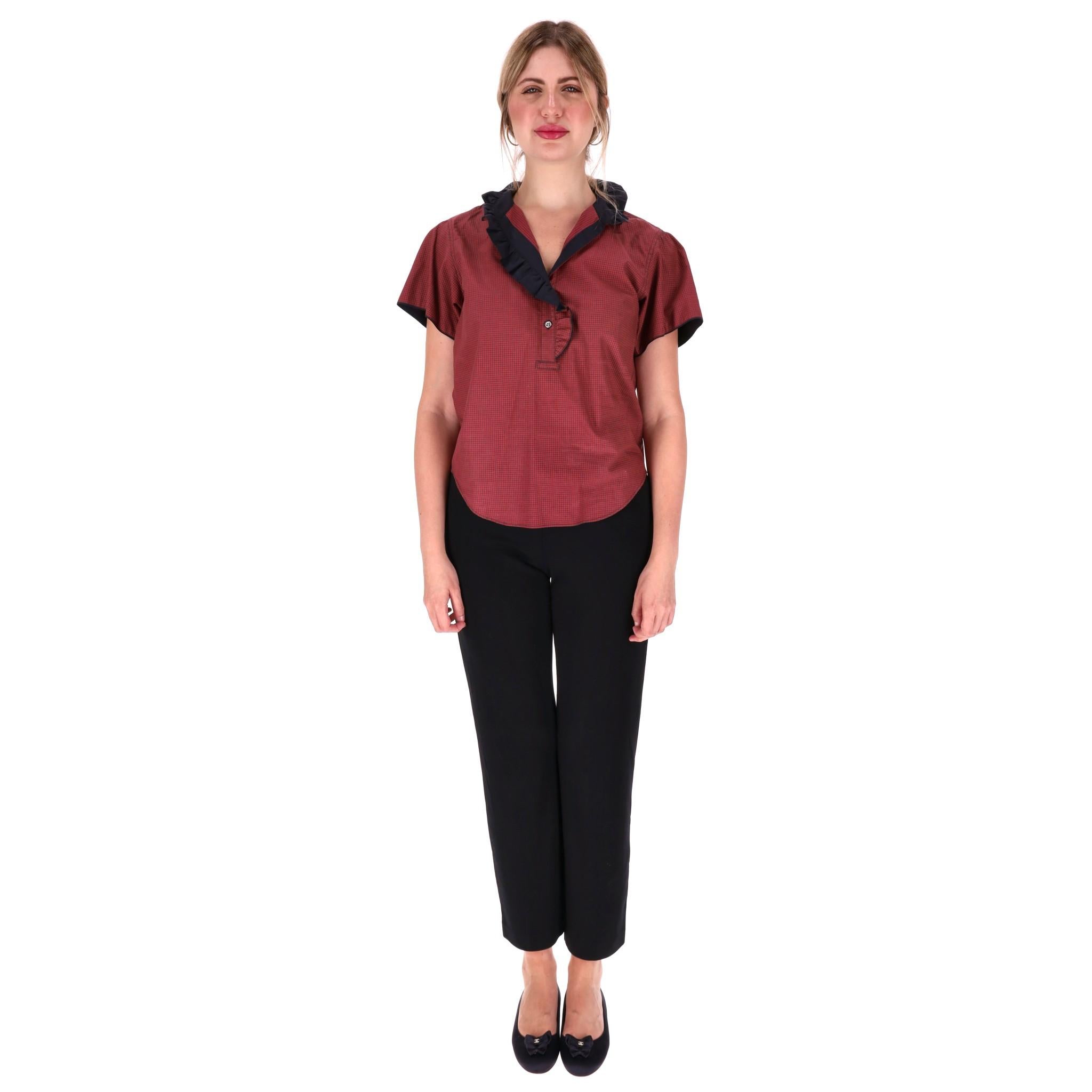 Isabel Marat Gingham Cotton Top With Ruffle Detail

Red and black gingham check patterned top crafted from cotton.

Designed with high ruffle neckline and ruffled button placket to the front.

Size – 40FR

Condition – Very Good

Composition – 100%
