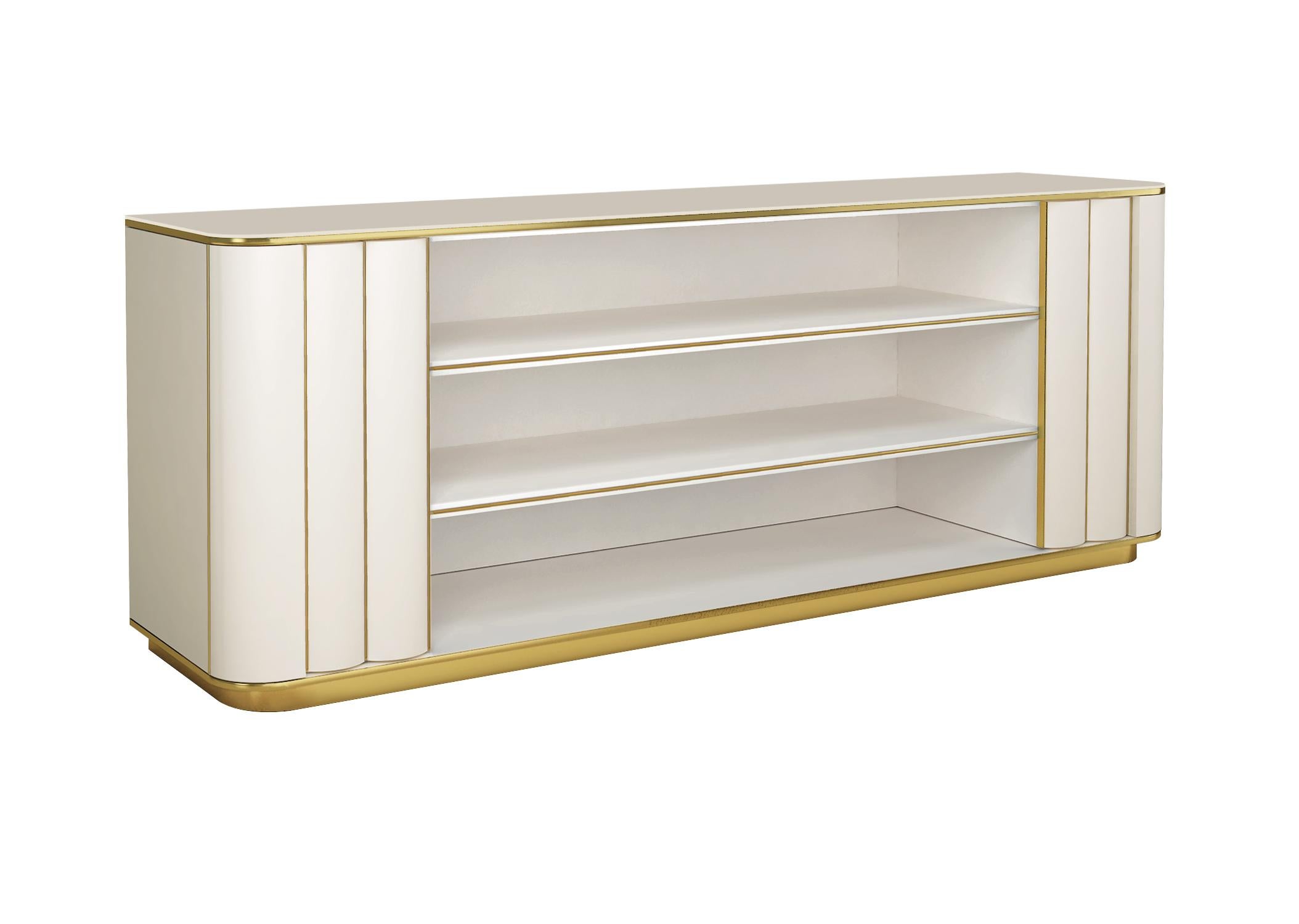 Designed by IC and beautifully crafted by Italian artisans, the Duilio bookcase features an open compartment with two large shelves embraced by ribbed doors on the sides. The brass, or powder coated metal, details and a stunning design will bring