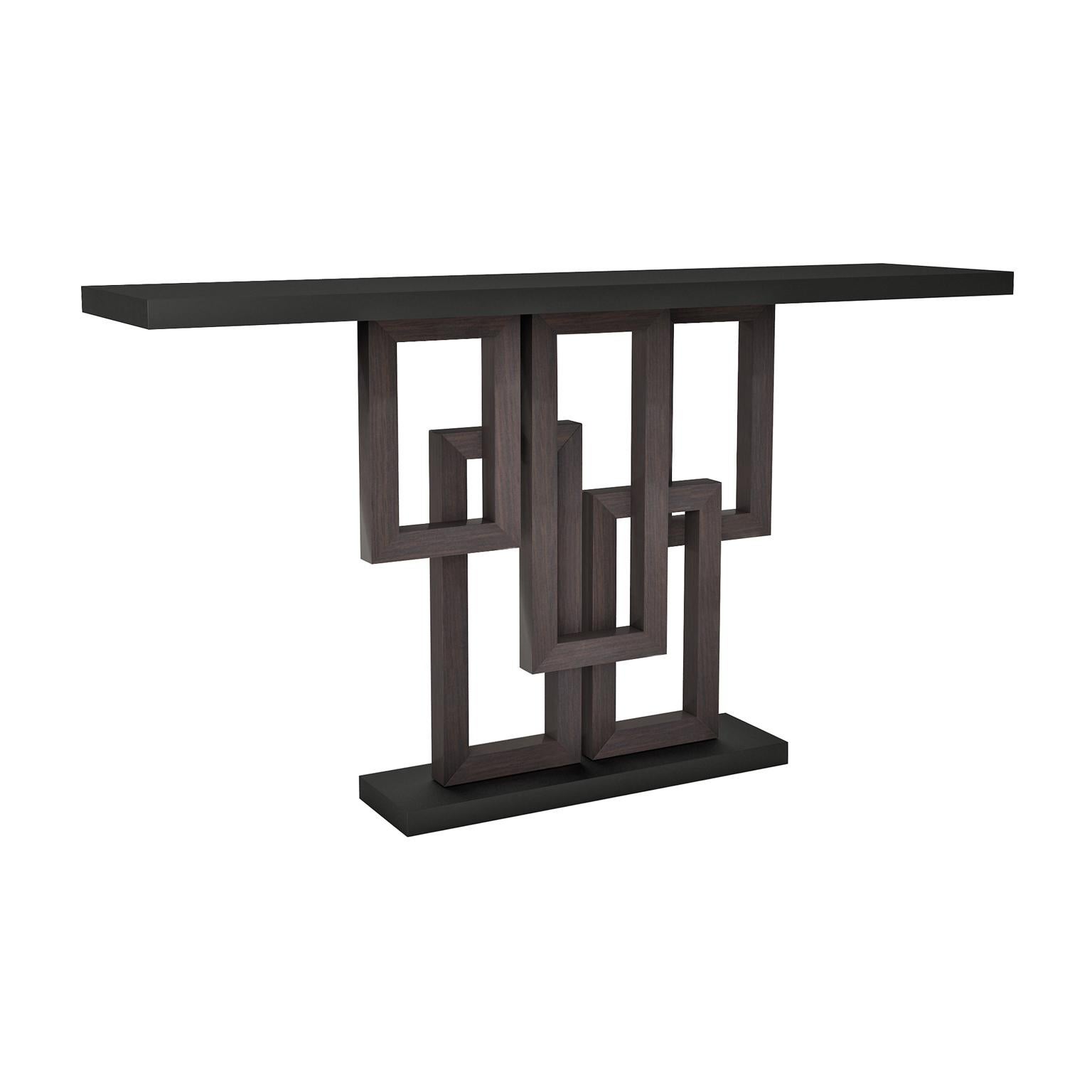Designed by IC and realized by skillful Italian artisans, the Thomas console features a wood top laying on a stunning geometric base that makes it a stand-out piece that will enrich any decor with sophisticated elegance.
Finish: Matte