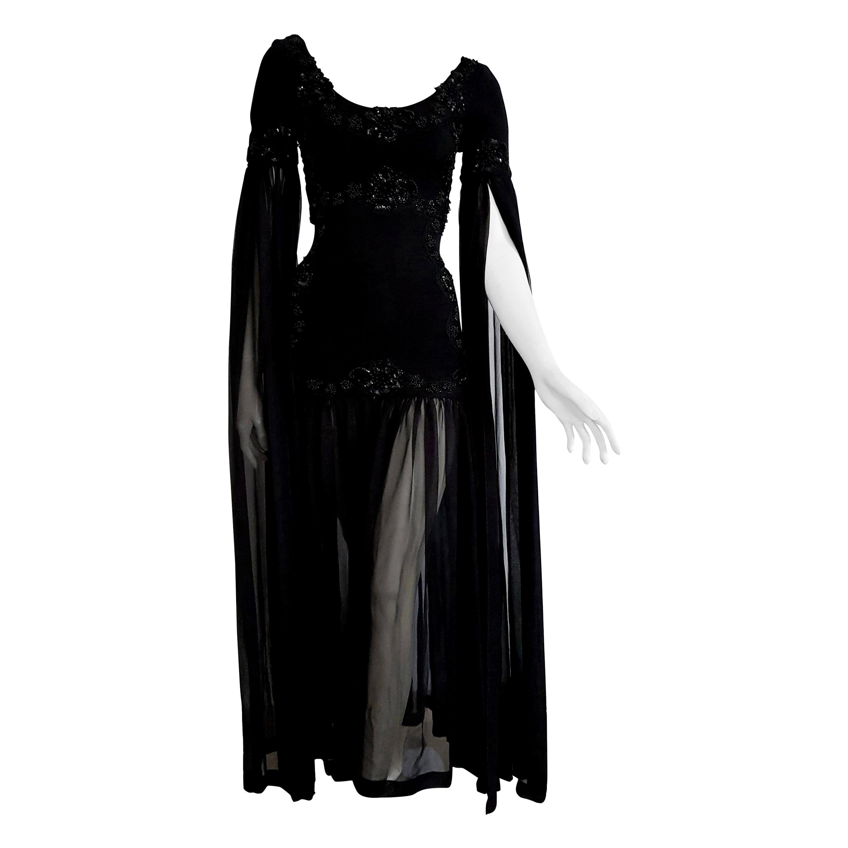Isabelle ALLARD Paris long draped chiffon sleeves, woolen bodice, embroidered, beaded, sequins, slightly transparent chiffon skirt, wool and silk black dress. Created in the atelier of the Rue Saint Honoré Paris - Unworn, New.

Isabelle ALLARD is a