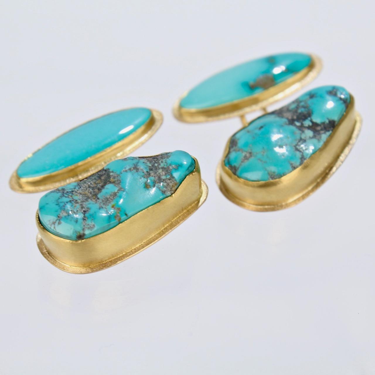 A very fine set of bezel set turquoise and gold cufflinks by Isabelle Posillico. 

These wonderful turquoise stones are set in a combination of 14k, 18K, and 22K gold and present as a truly striking pair of cufflinks.  

Posillico is highly regarded