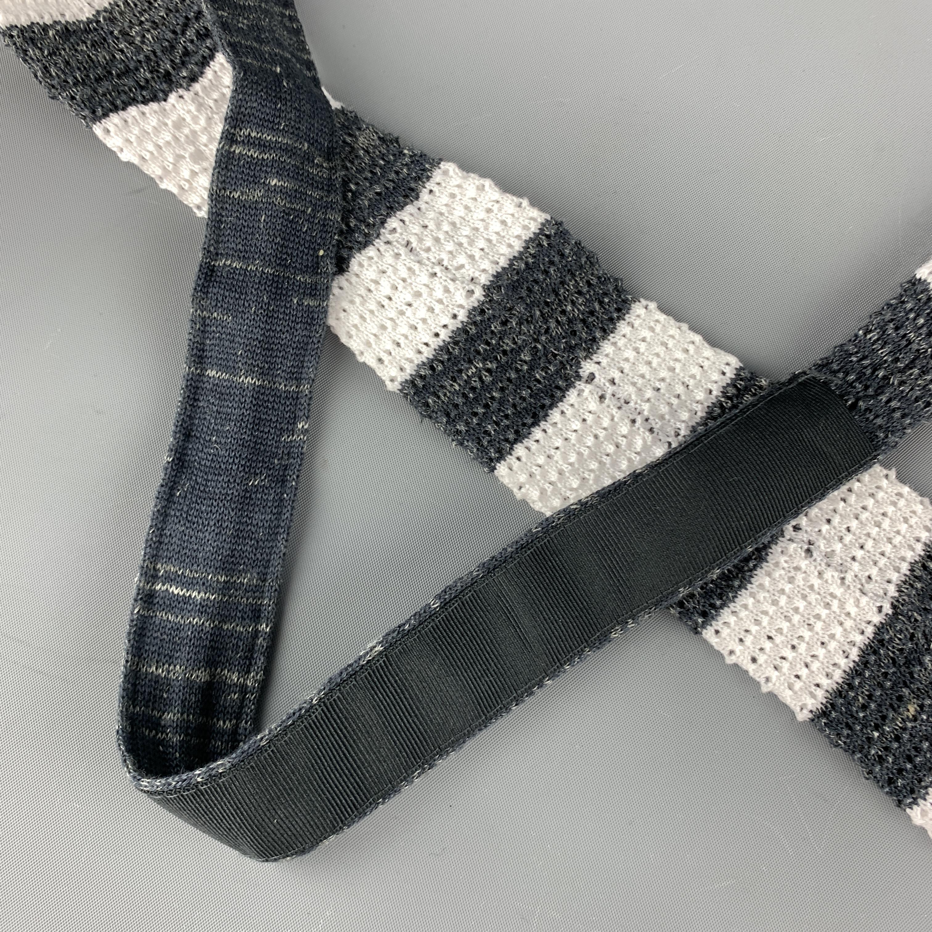 grey and white striped tie