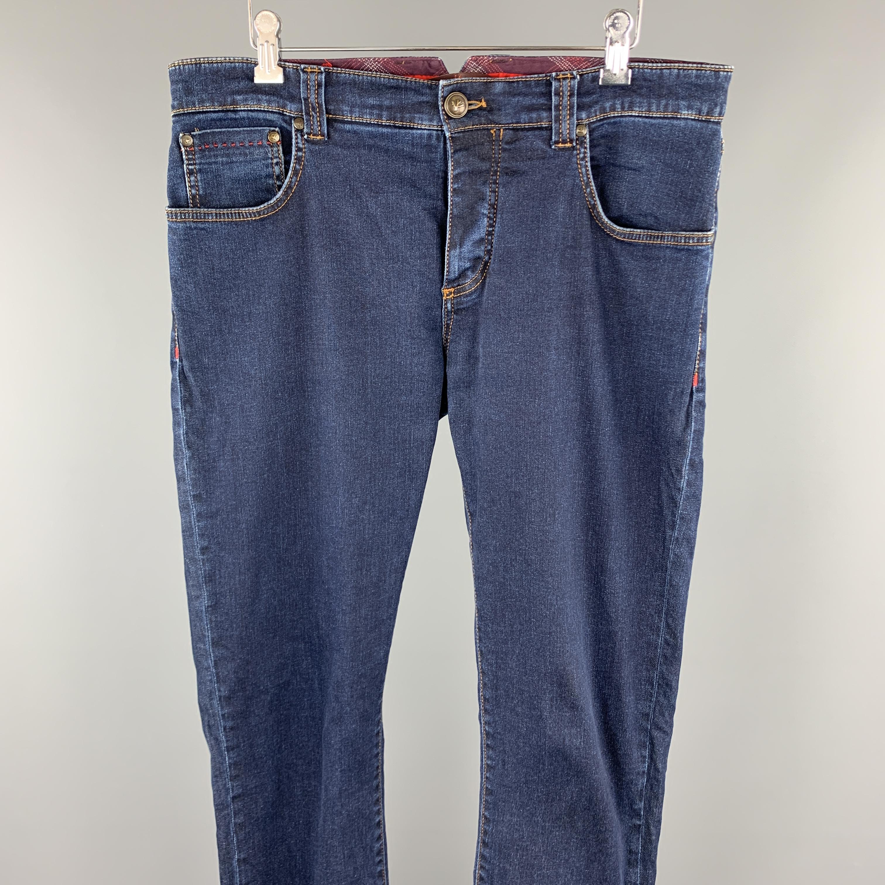 ISAIA jeans comes in a indigo cotton denim featuring contrast stitching and a button fly closure. Made in Italy.

Excellent Pre-Owned Condition.
Marked: IT 34/50

Measurements:

Waist: 34 in. 
Rise: 9 in. 
Inseam: 33 in. 