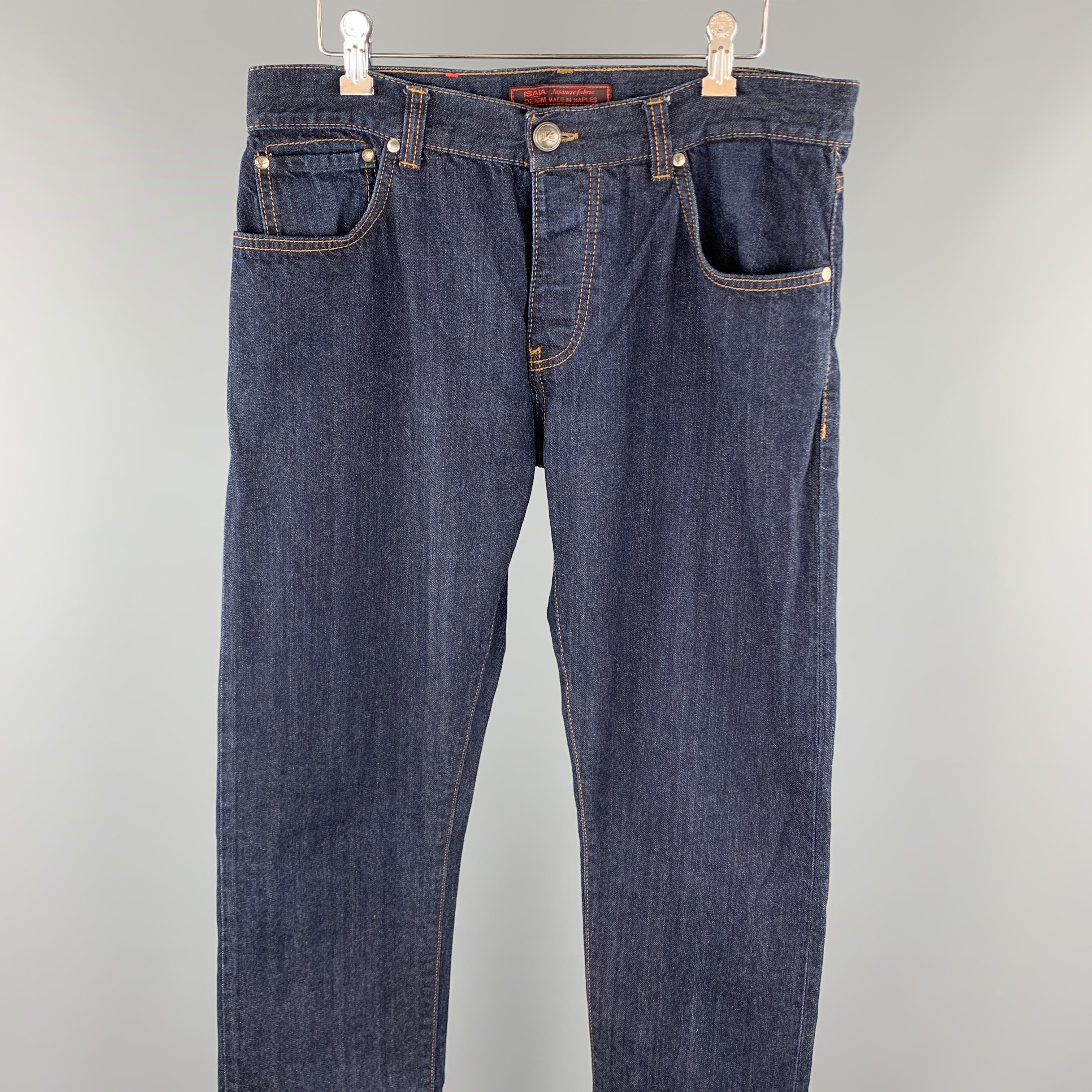 ISAIA jeans comes in a indigo selvedge denim featuring contrast stitching and a button fly closure. Made in Italy.

Excellent Pre-Owned Condition.
Marked: 34

Measurements:

Waist: 34 in. 
Rise: 9 in. 
Inseam: 34 in. 