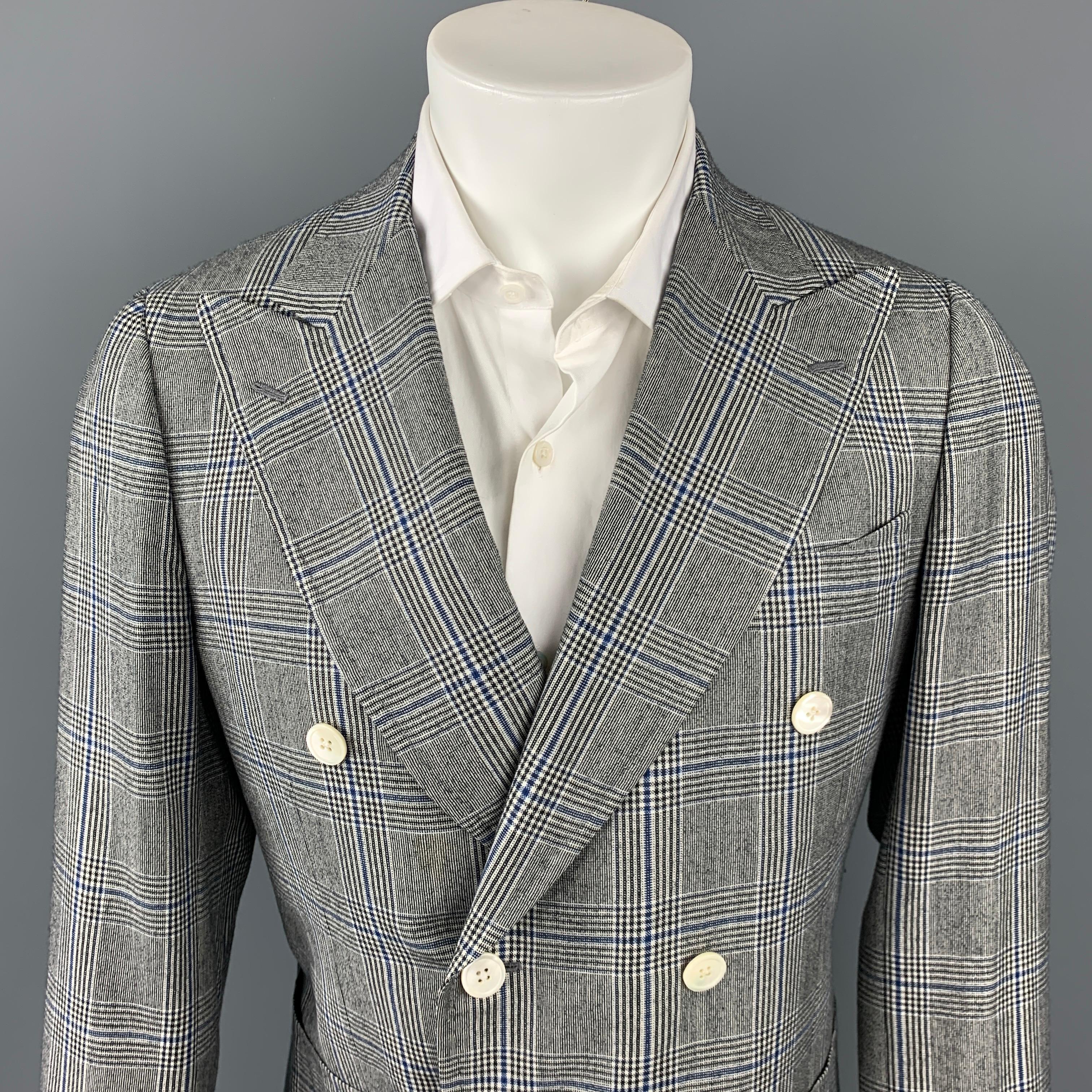 ISAIA sport coat comes in a grey & blue glenplaid wool with a half liner featuring a peak lapel, patch pockets, and a double breasted closure.

Very Good Pre-Owned Condition.
Marked: 48

Measurements:

Shoulder: 16.5 in.
Chest: 38 in.
Sleeve: 25.5