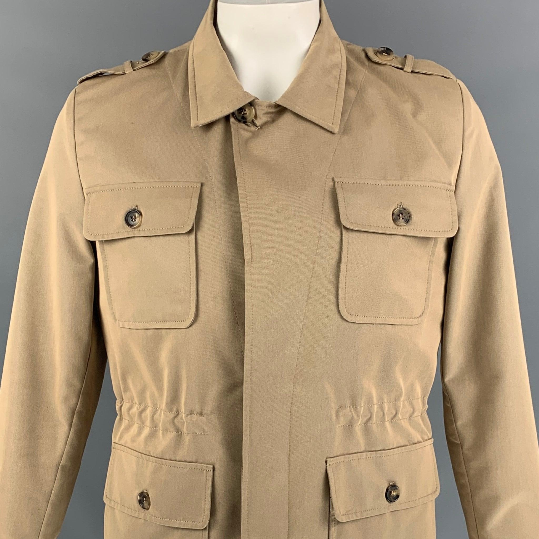 ISAIA jacket comes in a khaki cotton / polyester featuring an adjustable drawstring, epaulettes, spread collar, patch pockets, and a hidden placket closure. Made in Italy.
Excellent
Pre-Owned Condition. 

Marked:   50 R  

Measurements: 
 
Shoulder: