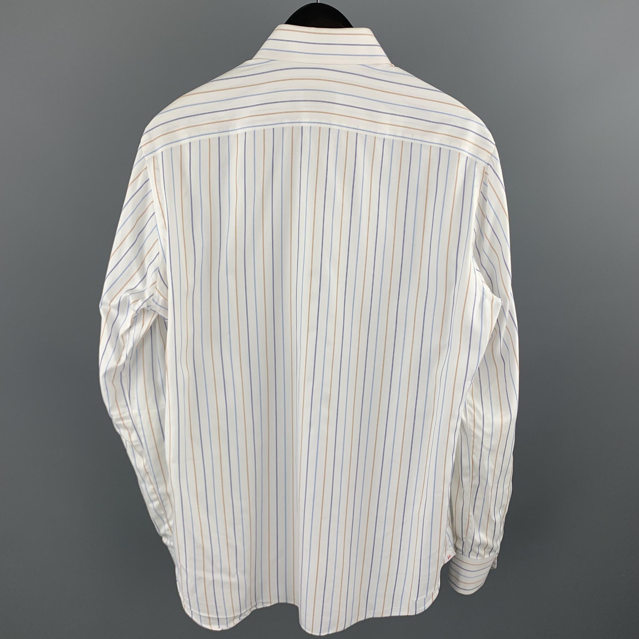 ISAIA long sleeve shirt comes in a white stripe cotton featuring a button up style and a spread collar. Made in Italy.

Excellent Pre-Owned Condition.
Marked: 40/15.5

Measurements:

Shoulder: 15.5 in. 
Chest: 42 in. 
Sleeve: 26.5 in. 
Length: 30.5