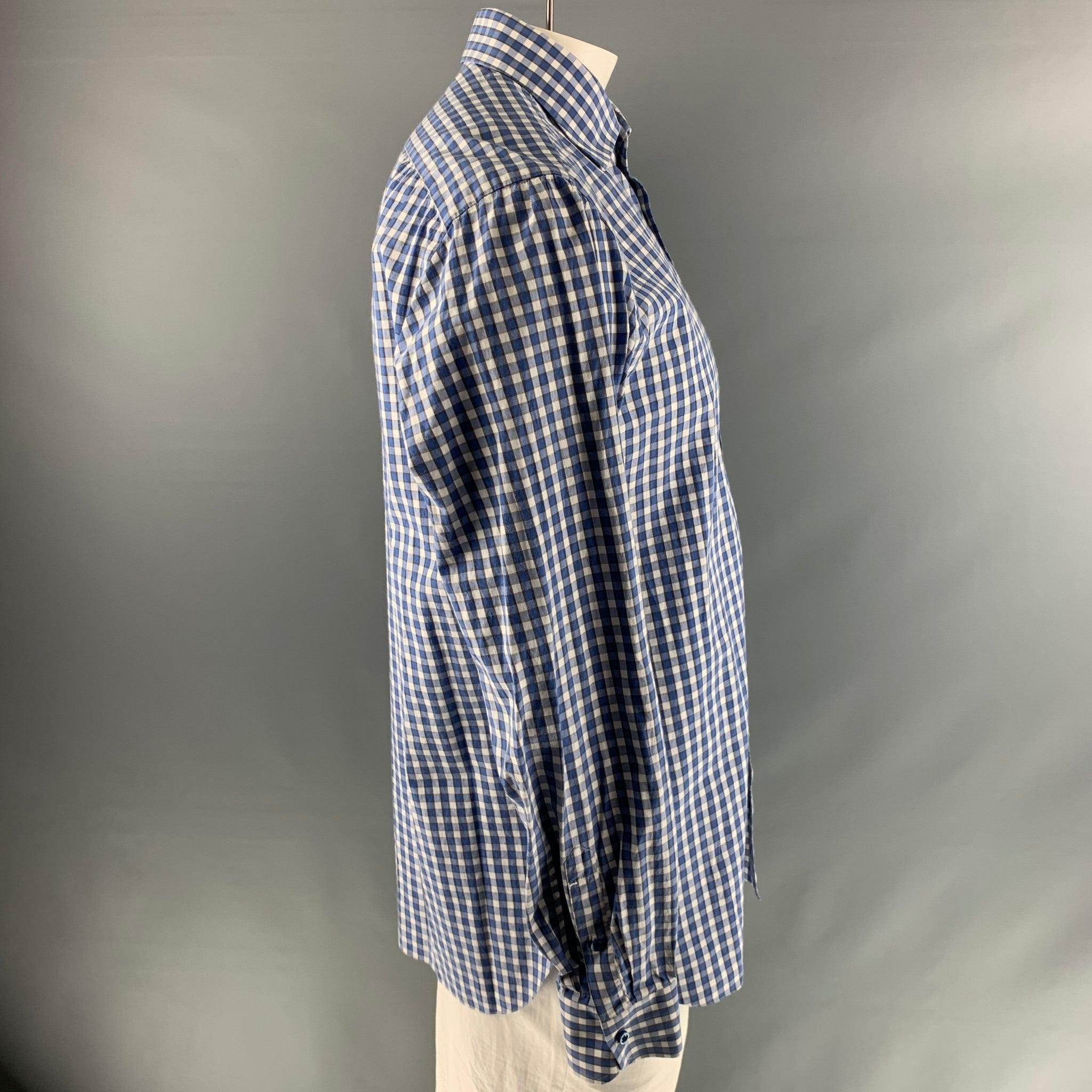 ISAIA long sleeve shirt comes in 100% cotton with a blue & white checkered design. It features a spread collar, and a button up closure.Very Good Pre-Owned Condition. 

Marked:   XL 

Measurements: 
 
Shoulder: 19 inches Chest: 50 inches Sleeve: 25