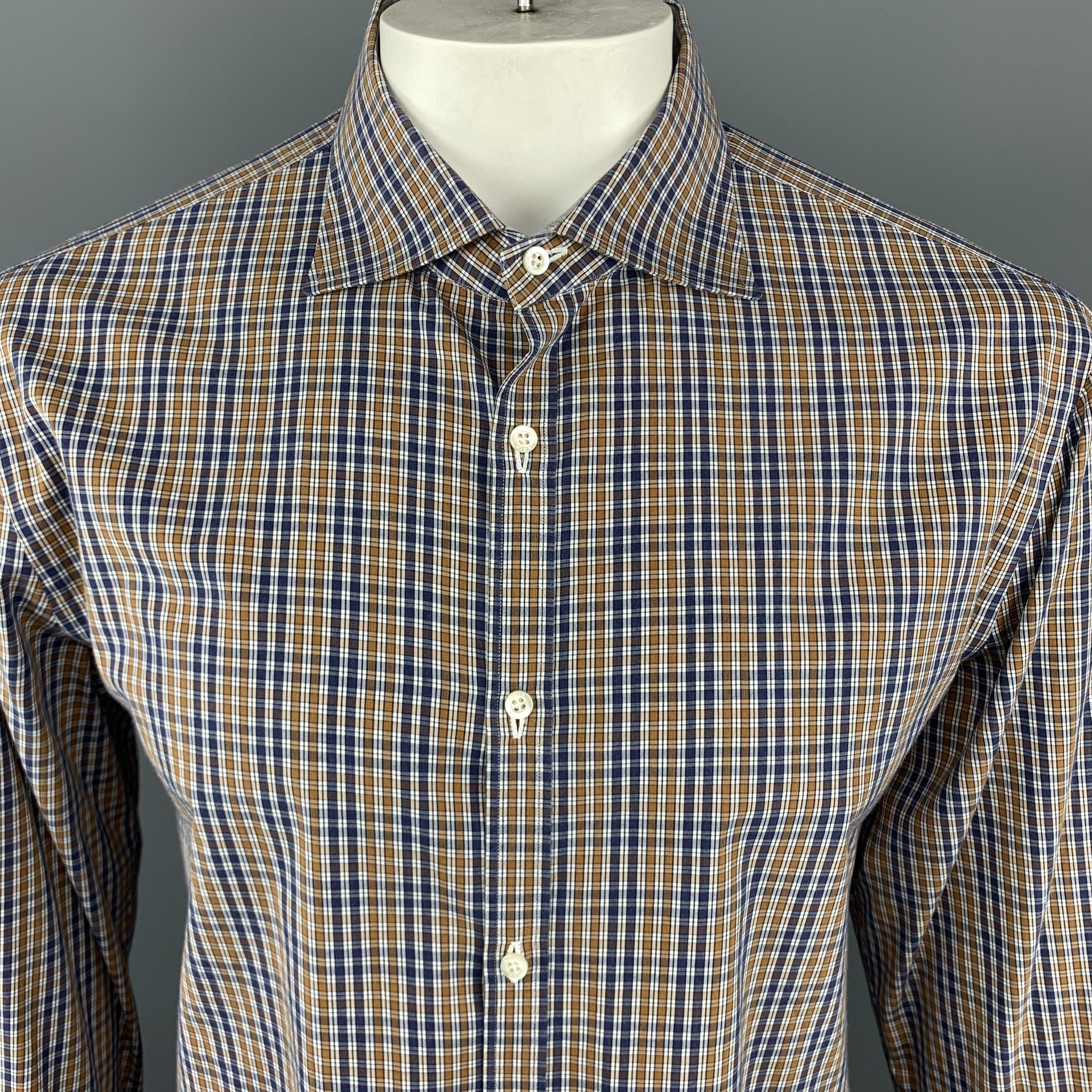 ISAIA Long Sleeve Shirt comes in navy and brown tones in a plaid cotton material, with a spread collar, buttoned cuffs, button up. Made in Italy.

Excellent Pre-Owned Condition.
Marked: 17 / 43

Measurements:

Shoulder: 18.5 in. 
Chest: 48 in.