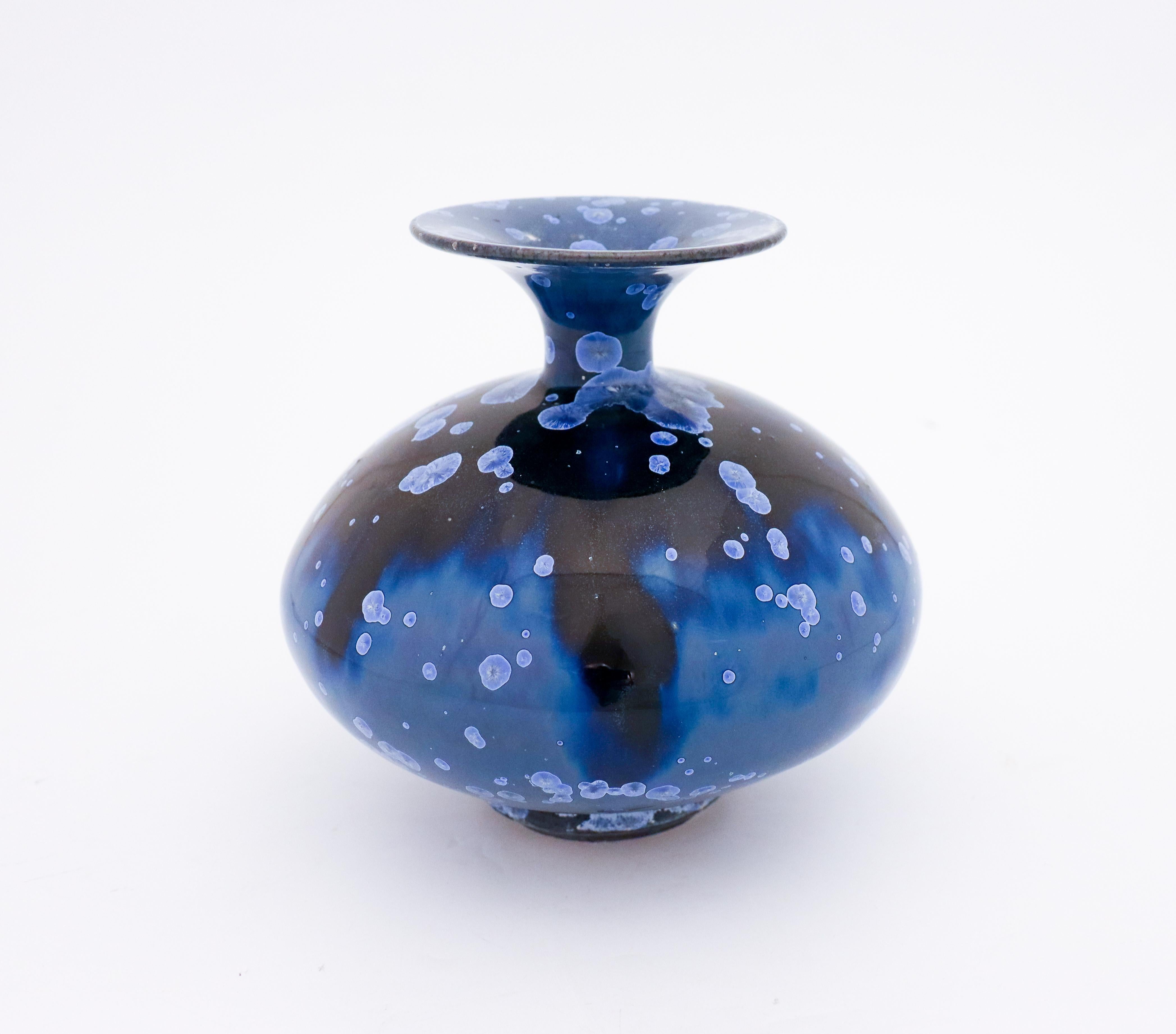 A unique vase in a black & blue crystalline glaze designed by the contemporary Swedish artist Isak Isaksson in his own studio. The vase is 17.5 cm (7