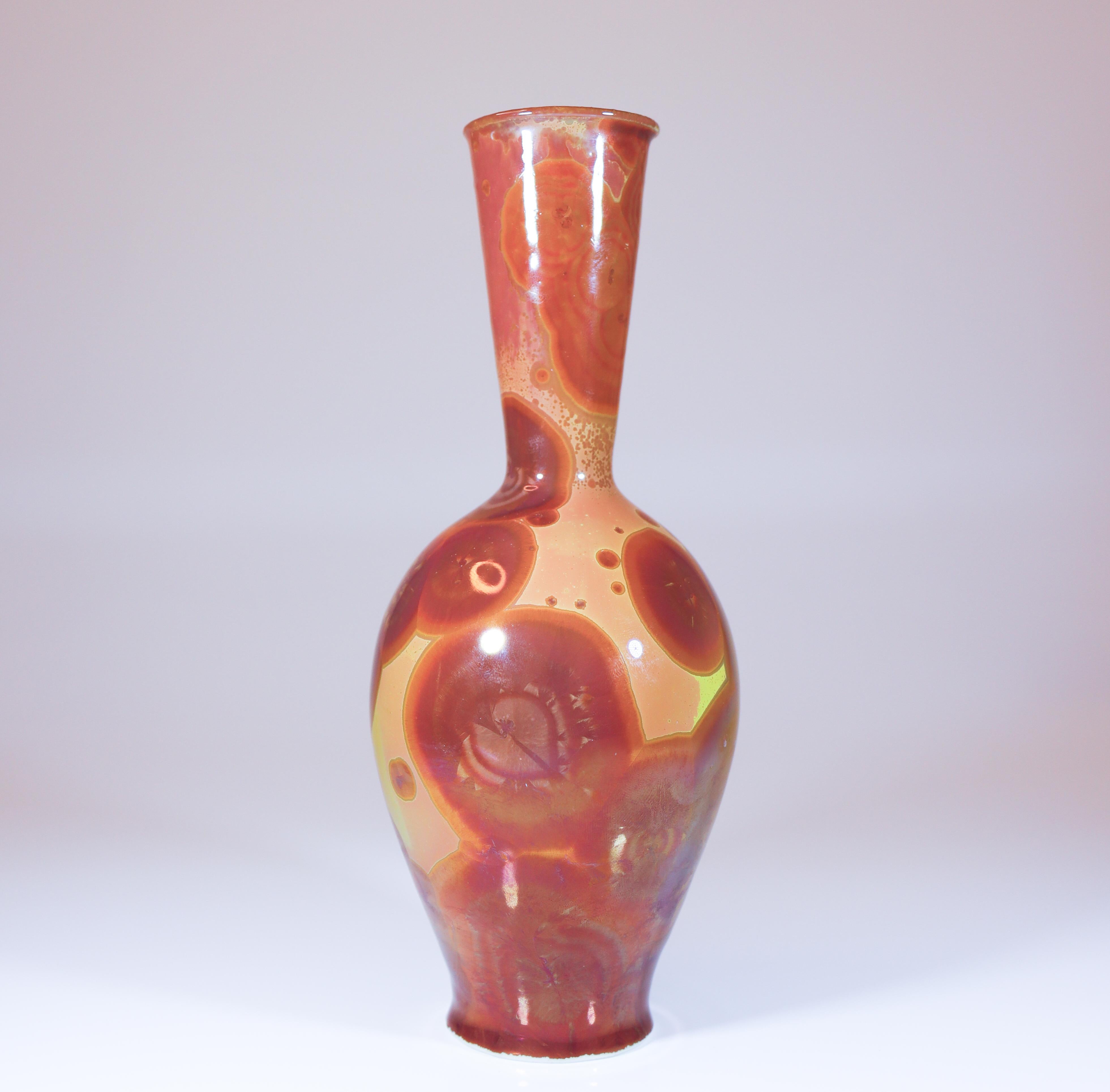 A vase with a crystalline glaze designed by Isak Isaksson in Sweden. The vase is 18.5 cm (7.4