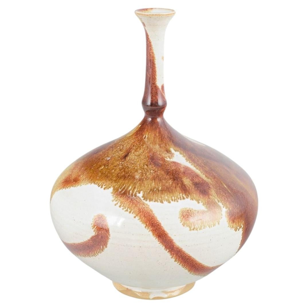 Isak Isaksson. Stoneware vase with tall slender neck and flowing glaze. For Sale