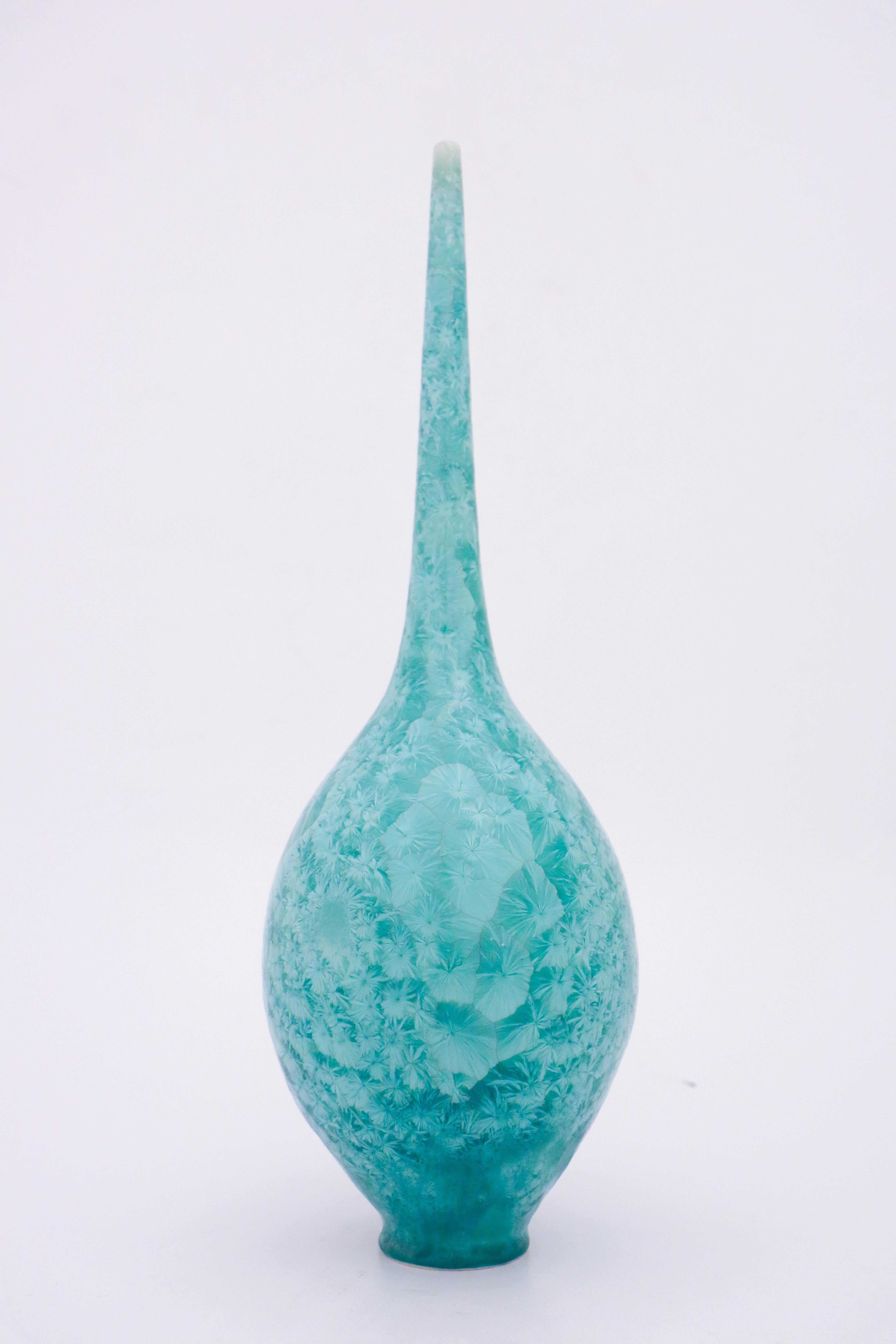 A unique vase in a stunning turquoise crystalline glaze designed by the contemporary Swedish artist Isak Isaksson in his own studio. The vase is 44 cm (17,6