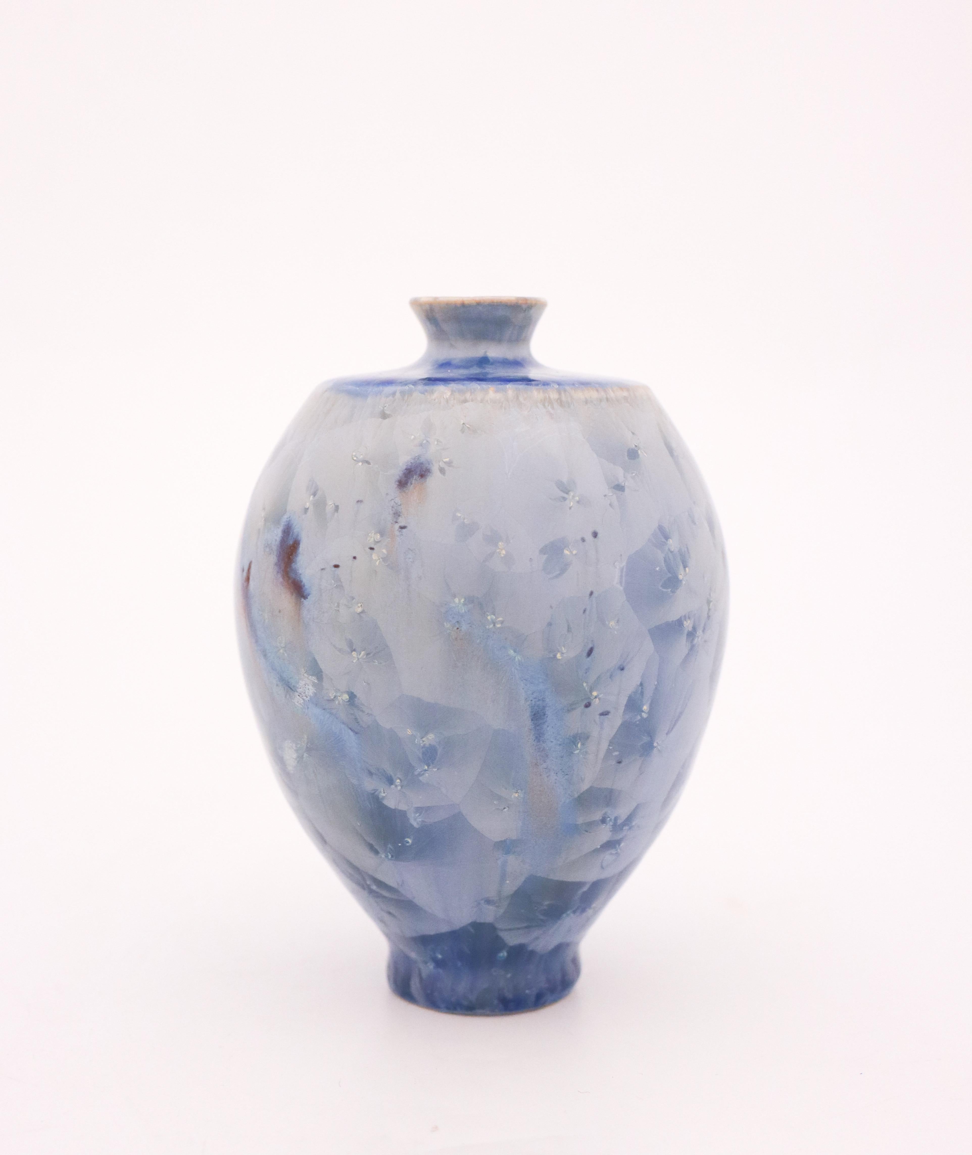 A unique vase with a blue crystalline glaze designed by the contemporary Swedish artist Isak Isaksson in his own studio. The vase is 14 cm (5,6