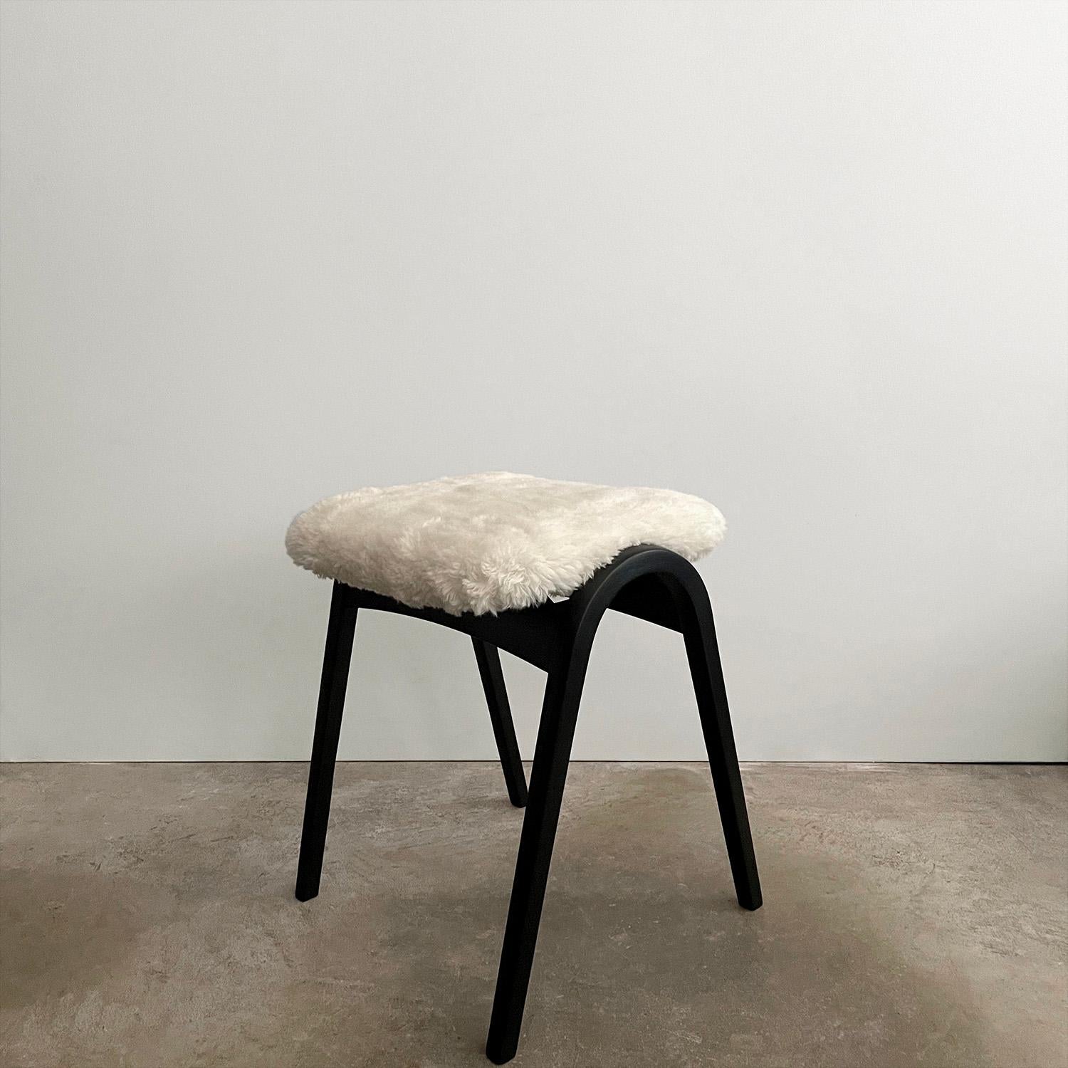 Isamu Kenmochi Japanese Bentwood & Italian Boucle Stool 
Japan, circa 1960s
Manufactured by Akita Mokko
Beautifully preserved, Timeless Classic
Sculpted bentwood beech base has been newly refinished in matte black
Seat has been reupholstered in wool
