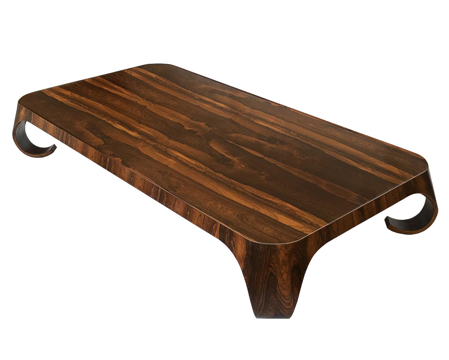 Isamu Kenmochi Brazilian rosewood coffee table for Tendo Mokko, circa 1965. This large, expansive coffee table was custom ordered as it is longer and lower than the standard table and measures 75