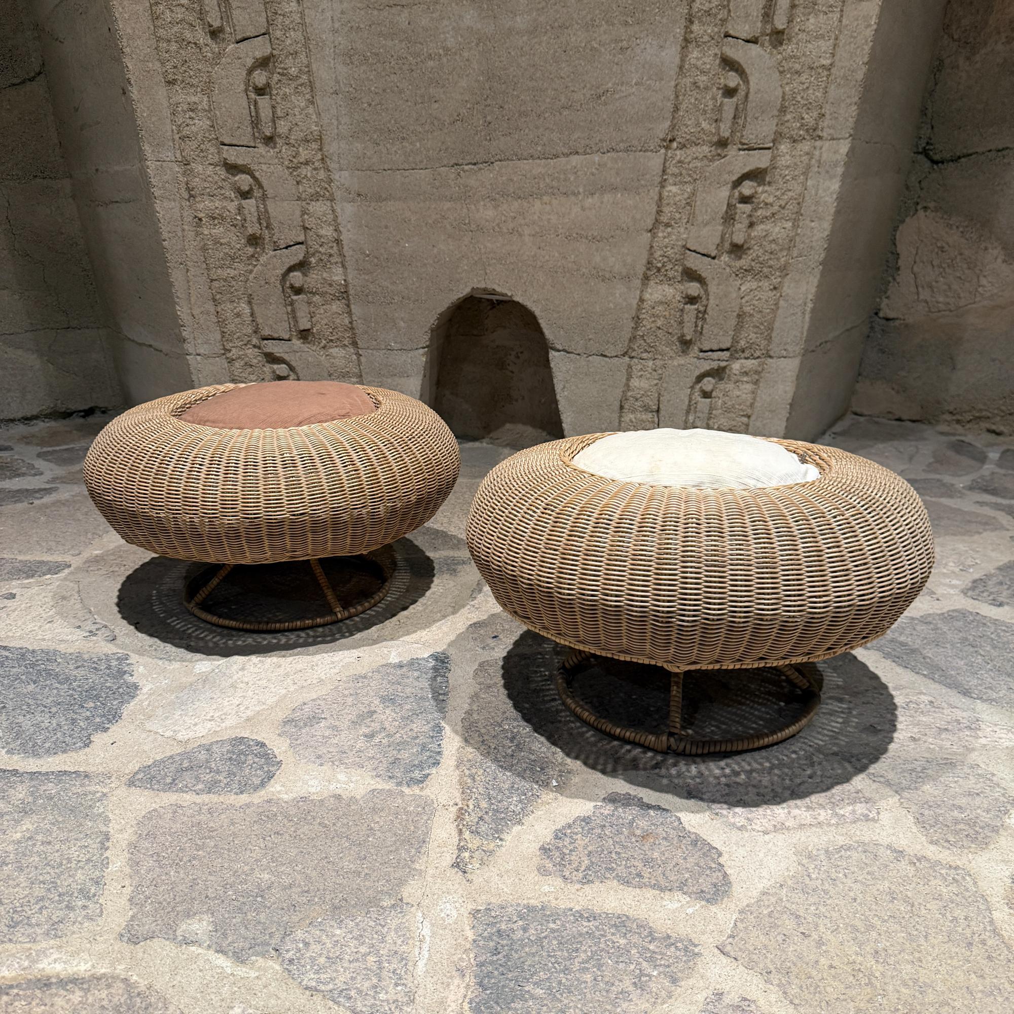For your consideration, a pair of ottomans designed by Isamu Kenmochi for Yamakawa Rattan Made in Japan. One chair has a ghost label. Firm and sturdy. Retains original upholstered cushions. They have been wioashdm, yet some light stains are present.