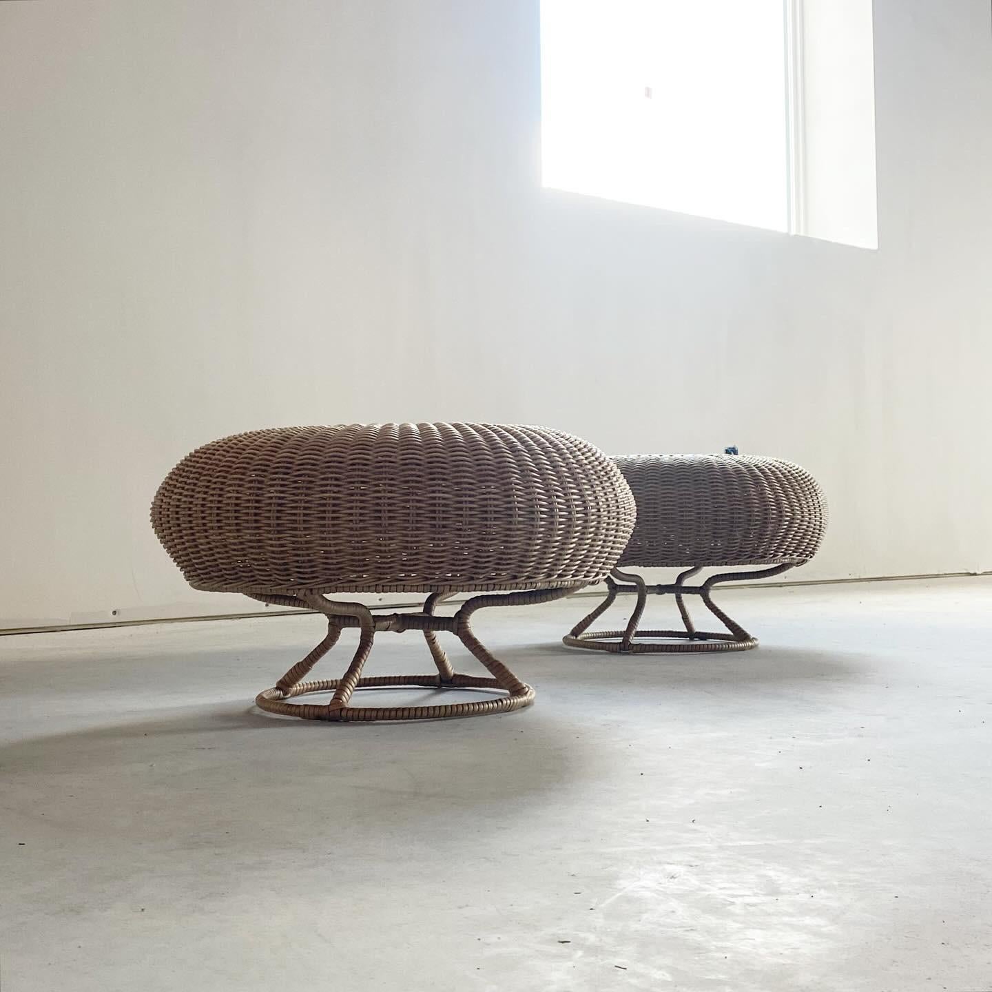 Isamu Kenmochi woven rattan pouf ottomans, 1970s for Yamakawa Rattan, Japan

This very scarce pair of ottomans by Mr. Kenmochi are both in very good original condition. They are constructed with a steel internal structure and then woven with rattan.