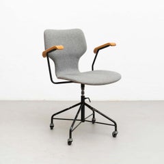 Isamu Kenmochi Laminated Wood and Grey Fabric Swivel Office Chair, circa 1950