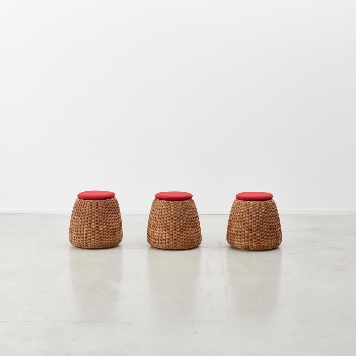 Braided rattan model S301 stool designed by Isamu Kenmochi (1912–1971). Original circular cushion in red woollen cloth, circa 1962. From the literature:’ Modern Japanese: Retrospective Kenmochi Isamu’ 2004, pp94 – 95 and ‘Made in Japan 1950s–1960s’