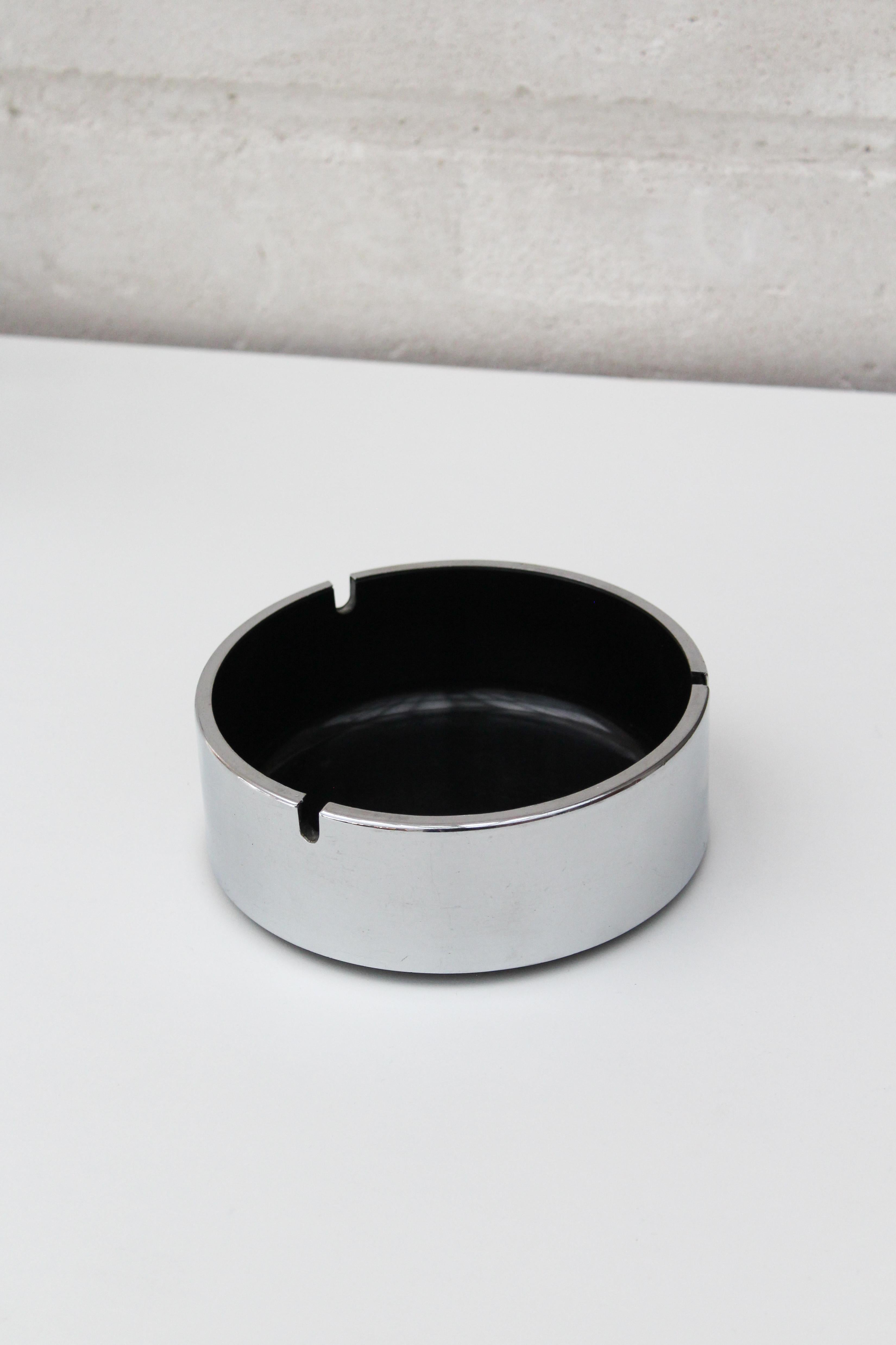 Isamu Kenmochi was a prominent Japanese designer and a key figure in the development of modern design in Japan. He was part of a movement that sought to blend traditional Japanese craftsmanship with modernist principles, resulting in objects that