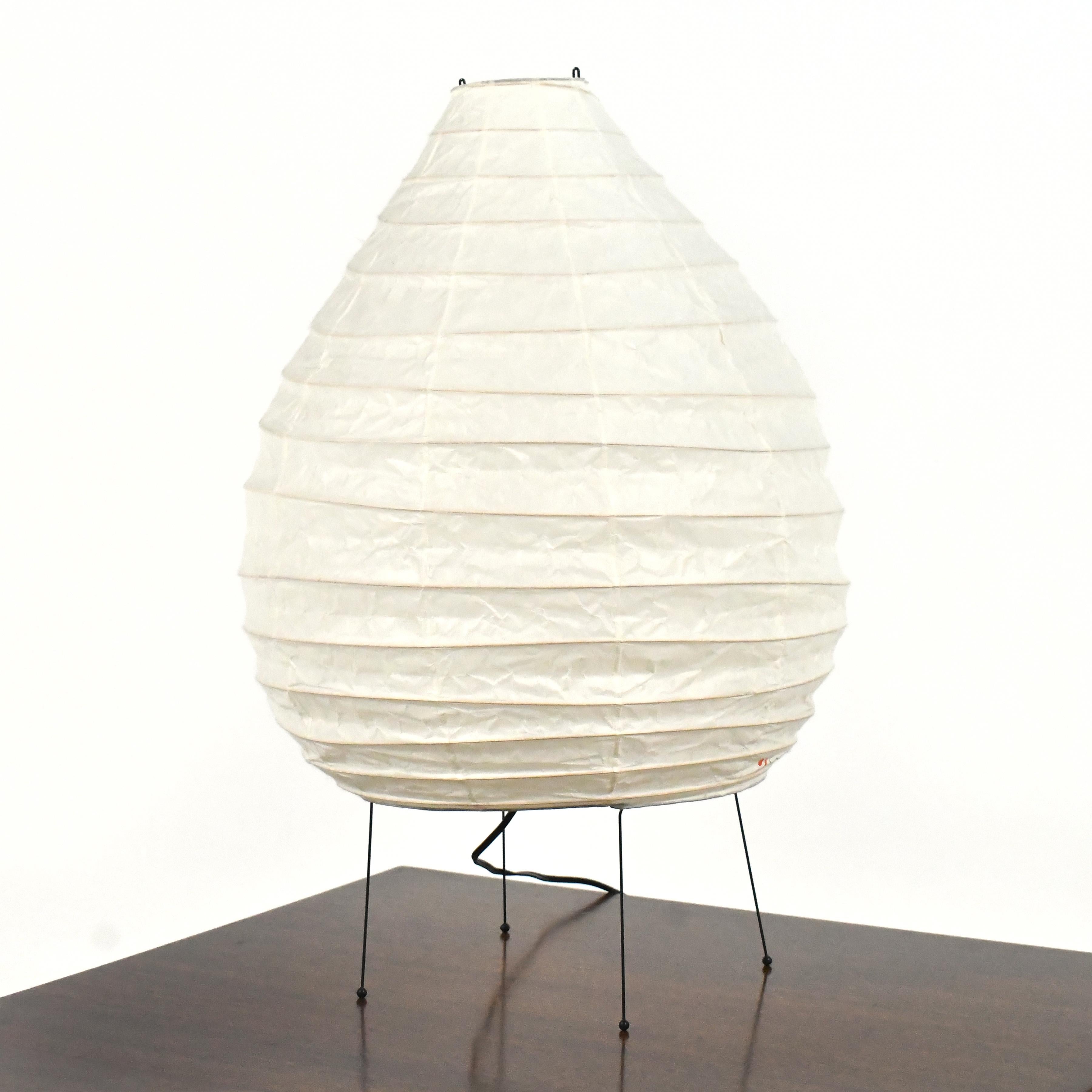 Noguchi designed a series of lamps starting in the 1950s, this 22N Akari designed in 1968 is a beautiful example of his 