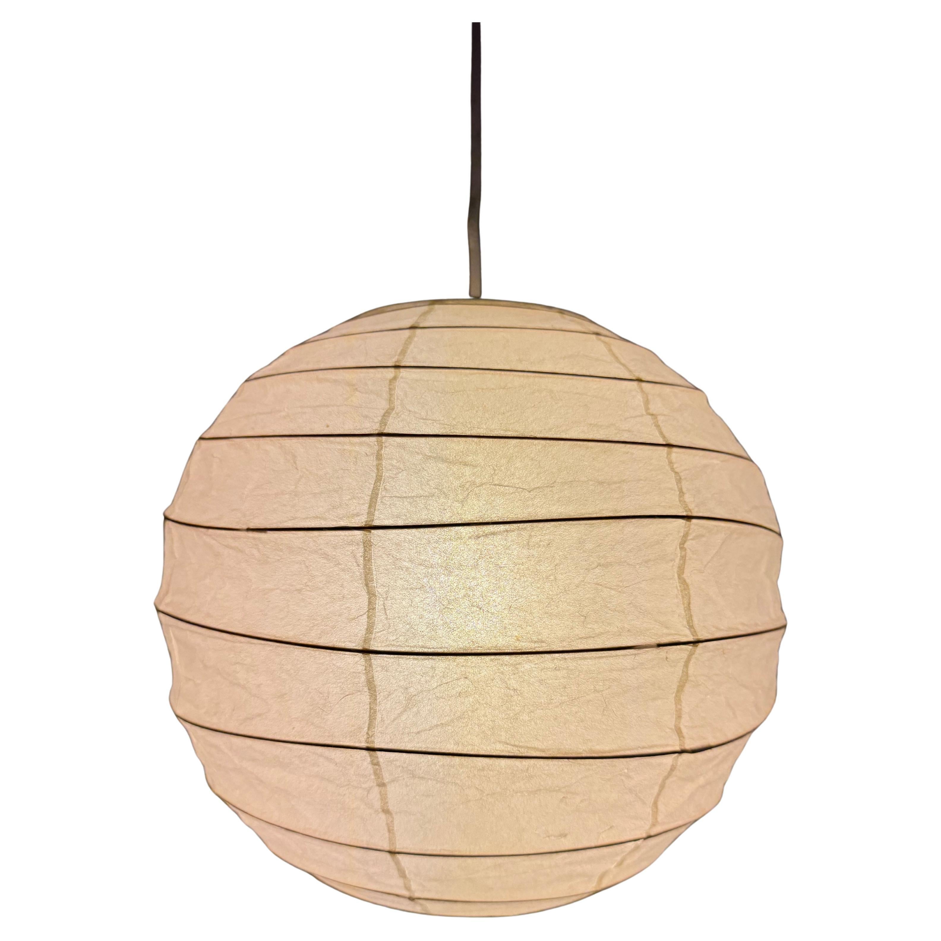 How do I assemble a Noguchi paper lantern floor lamp?