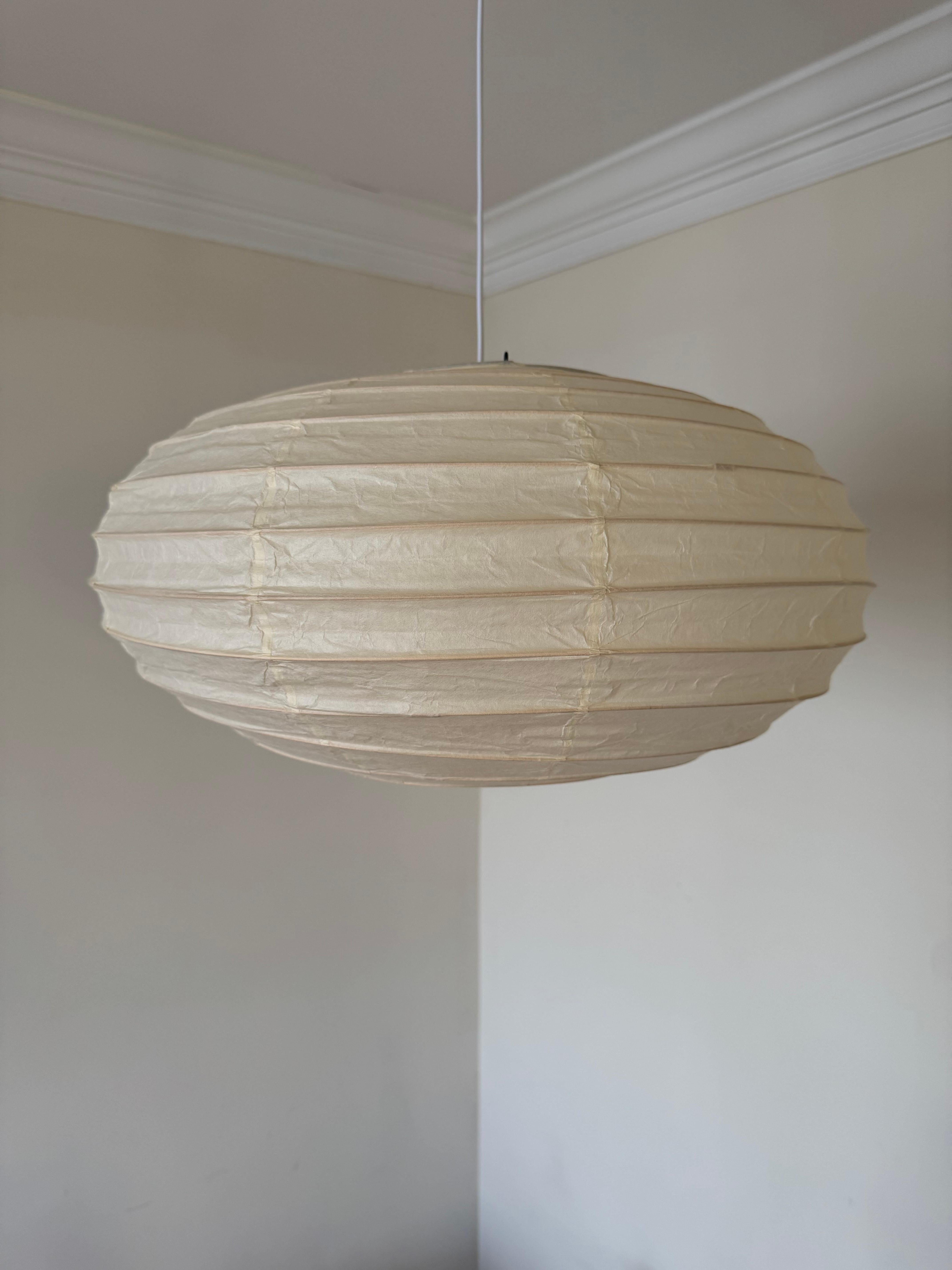 Akari Light Sculptures by Isamu Noguchi are considered icons of 1950s modern design. Designed by Noguchi beginning in 1951 and handmade for a half century by the original manufacturer in Gifu, Japan, the paper lanterns are a harmonious blend of