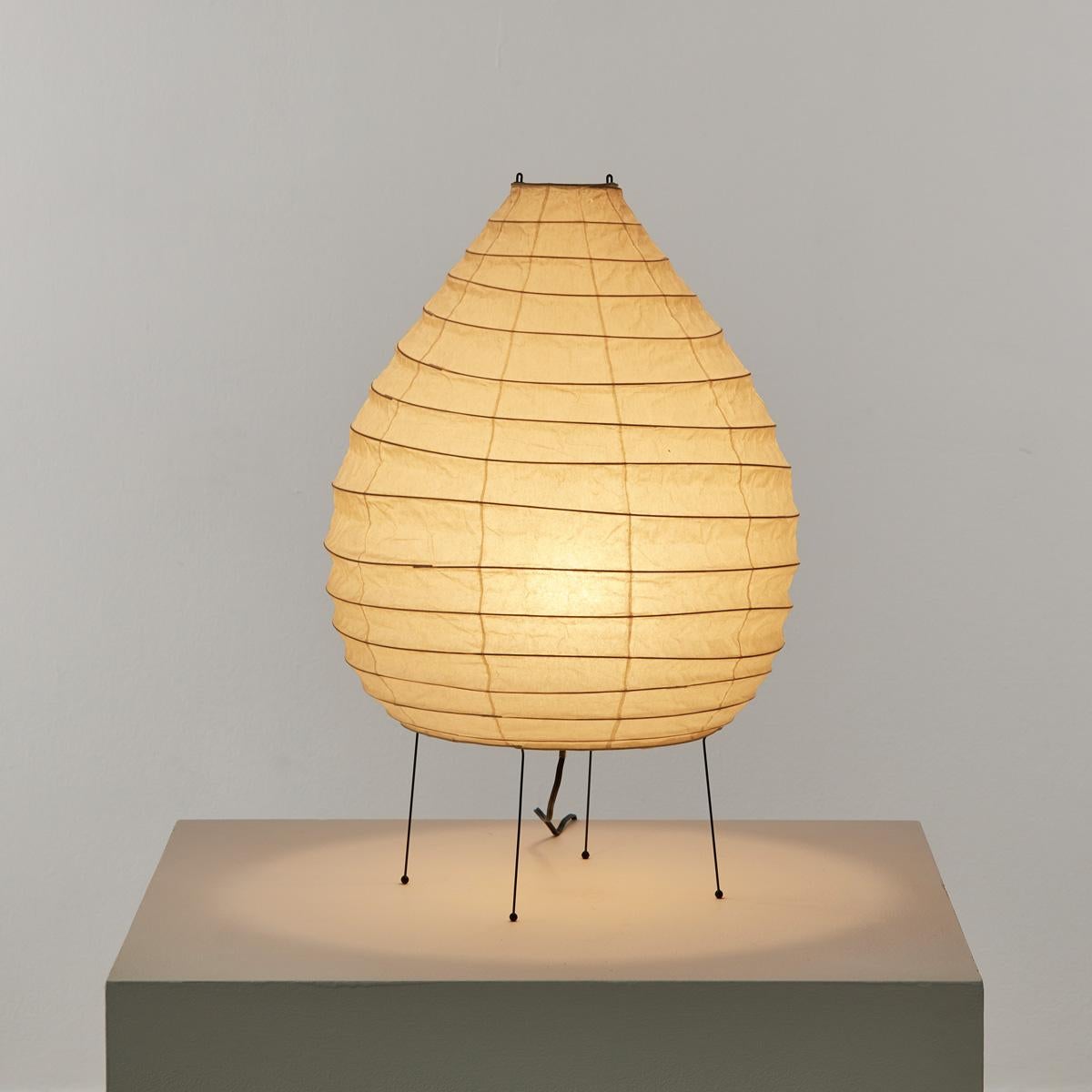 Isamu Noguchi (1904 – 1988) was an artist, furniture designer, ceramicist, theatre designer and landscape architect. In 1951, he began designing Akari Light Sculptures – 100 of them – to reinvigorate the flailing craft of lantern making in Ozeki.