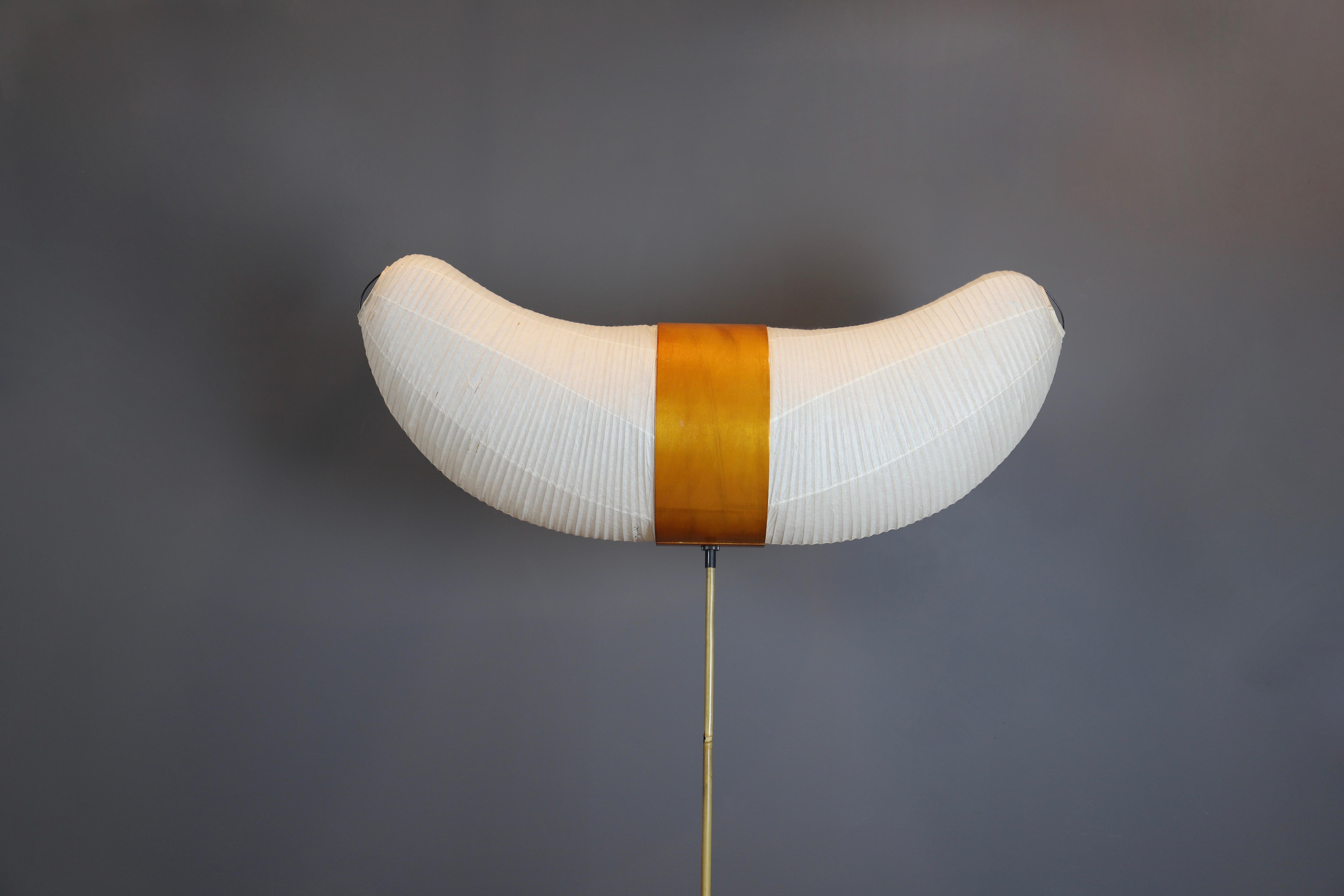 Rare model Akari floor lamp by Isamu Noguchi in original working condition from the 1970s.
Washi paper shade has no rips or repairs and event hough fragile, is in beautiful vintage condition with warm patina.
Shade is marked with moon and sun and