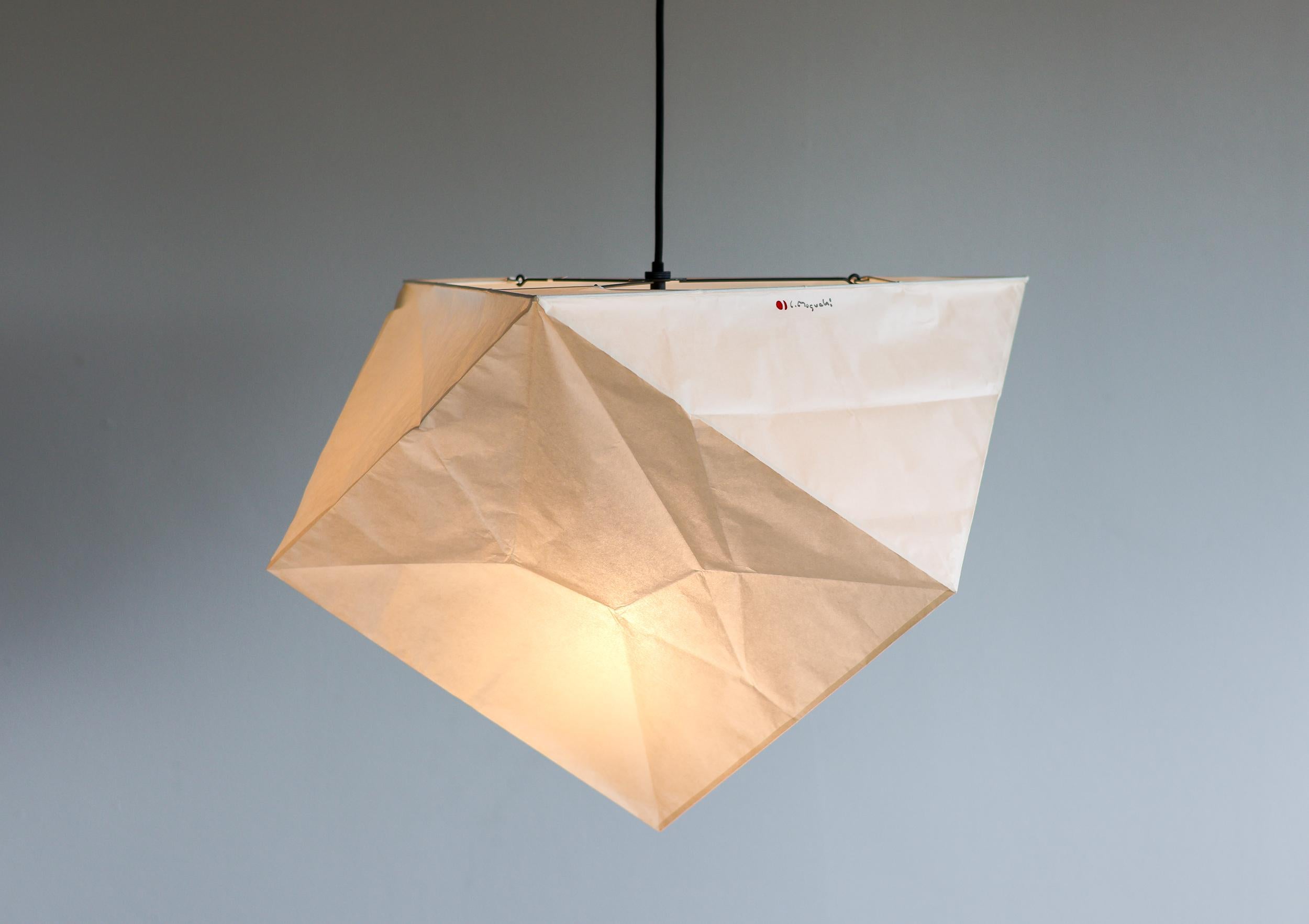 Beautiful Akari YP1 pendant designed by Isamu Noguchi, 1951. Manufactured by Ozeki & Co. in Japan. 
Bambu structure covered by washi paper. Wired for U.S. standards. 
Recent version, new cord and canopy. 
This fixture has one socket. We recommend