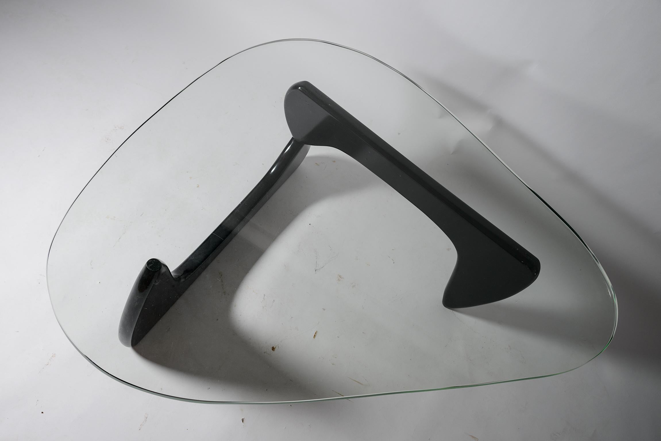 Isamu Noguchi IN-50 Coffee Table
Originally designed in 1944
This example C 1955 
Manufactured by Herman Miller
Original Black Lacquered base
Beautiful Green Edged Original Top with the original Alcoa Aluminum pivot 