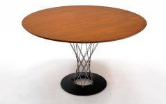 Isamu Noguchi Cyclone Dining /Center Table. Teak Top, Chrome Supports, Iron Base