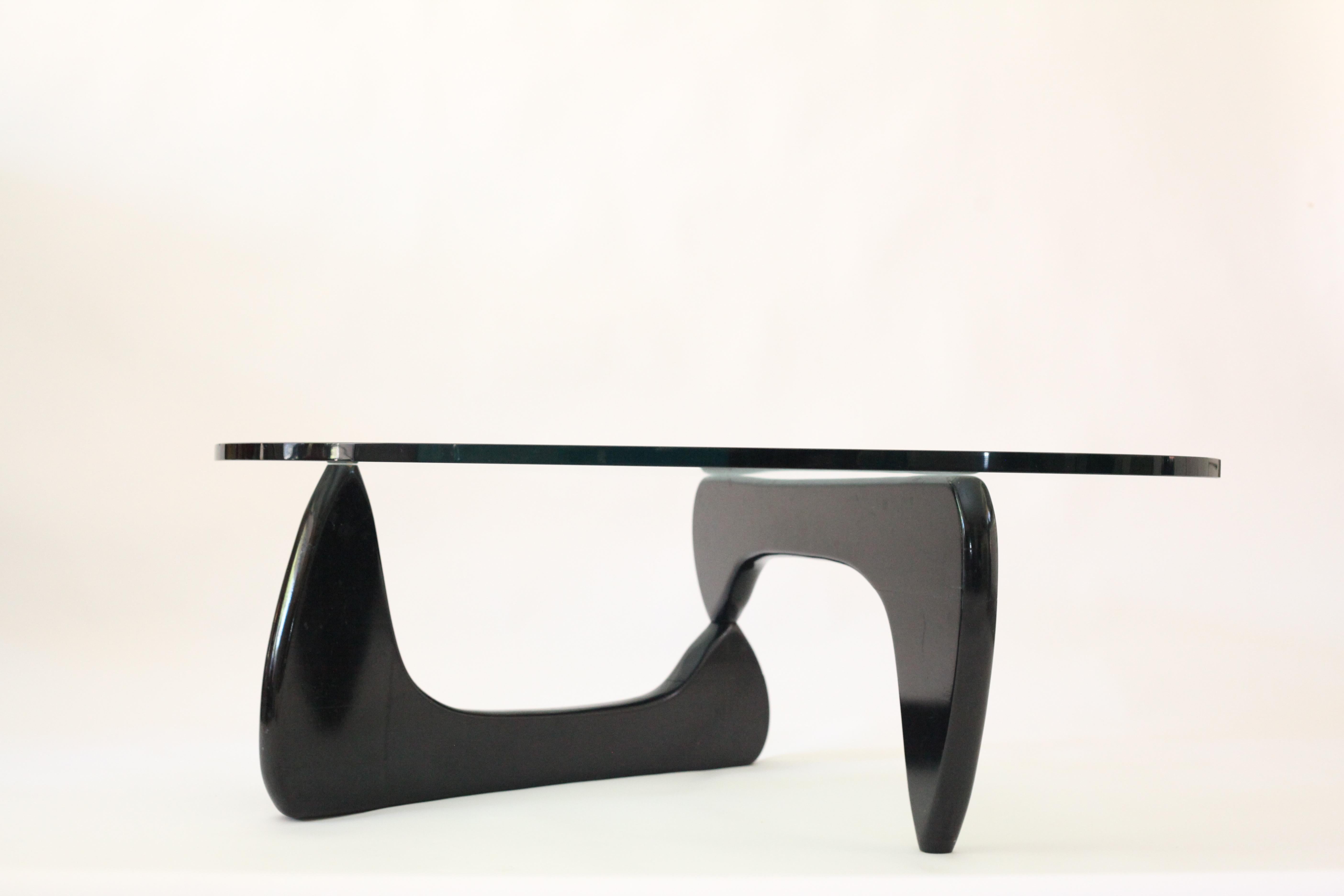 Authentic, documented 1959 Isamu Noguchi IN 50 ebonized black coffee table for Herman Miller. Glass is in great condition and a copy of the original receipt is available. A collectors piece.