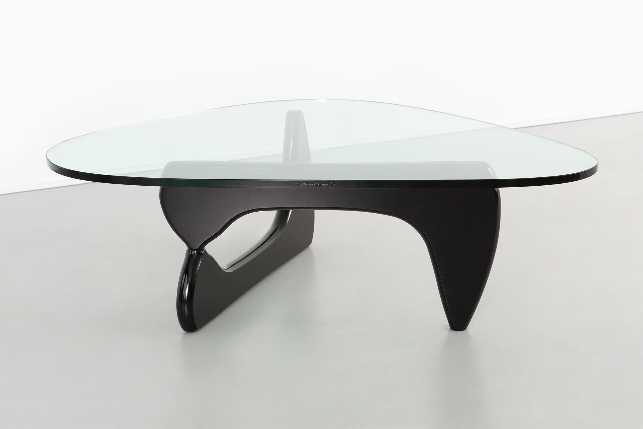 Coffee table

Designed by Isamu Noguchi for Herman Miller

USA, circa 1990s

Wood and glass.

Measures: 15 ¾” H x 40 ¾” W x 50 ?” D 

This authentic table has Noguchi’s signature etched into the side of the glass with the manufacturer’s