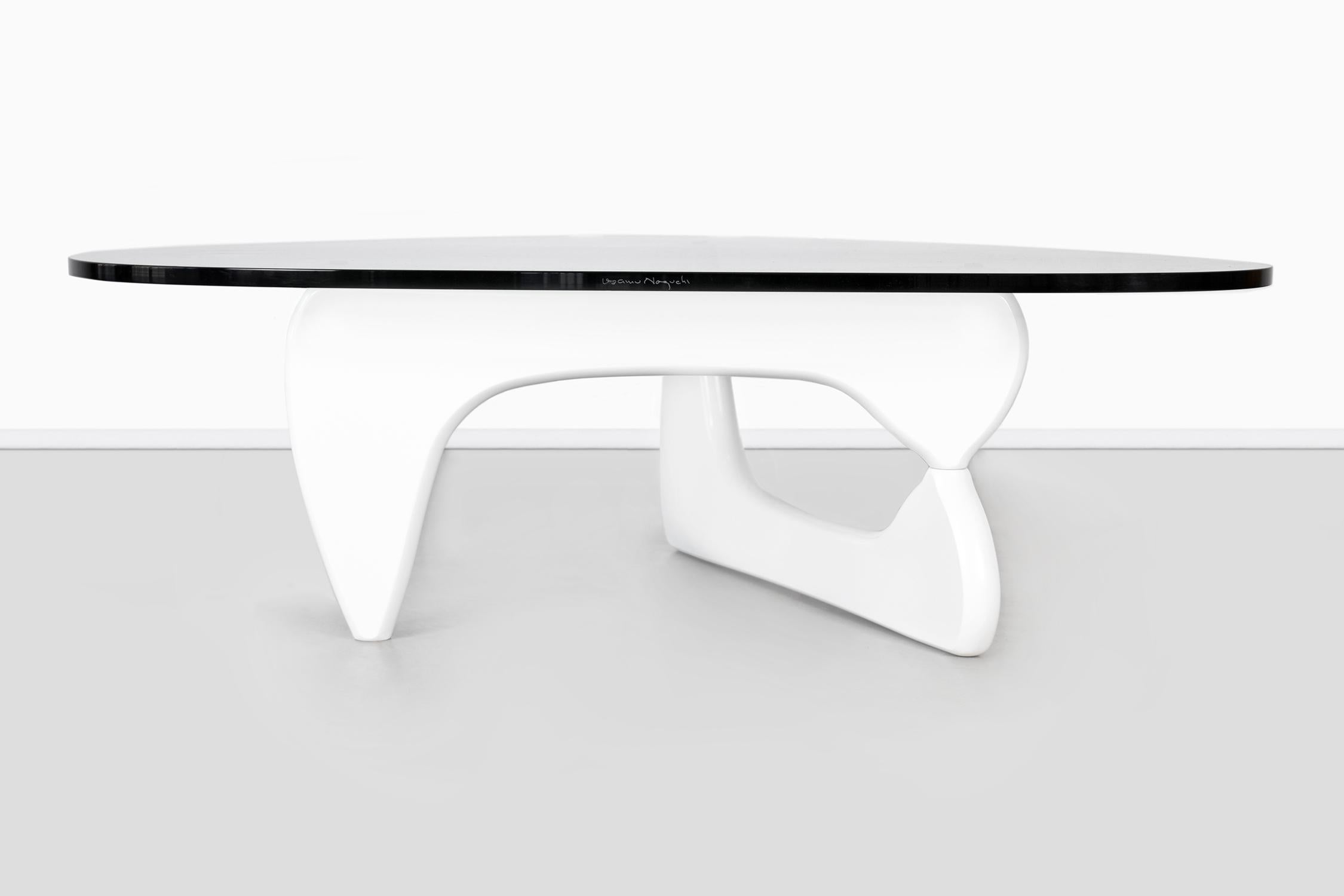 Coffee table

Designed by Isamu Noguchi for Herman Miller

USA, circa 1990s

Wood and glass

Measures: 15 ¾” H x 40 ¾” W x 50”? D

This authentic table has Noguchi’s signature etched into the side of the glass with the manufacturer’s