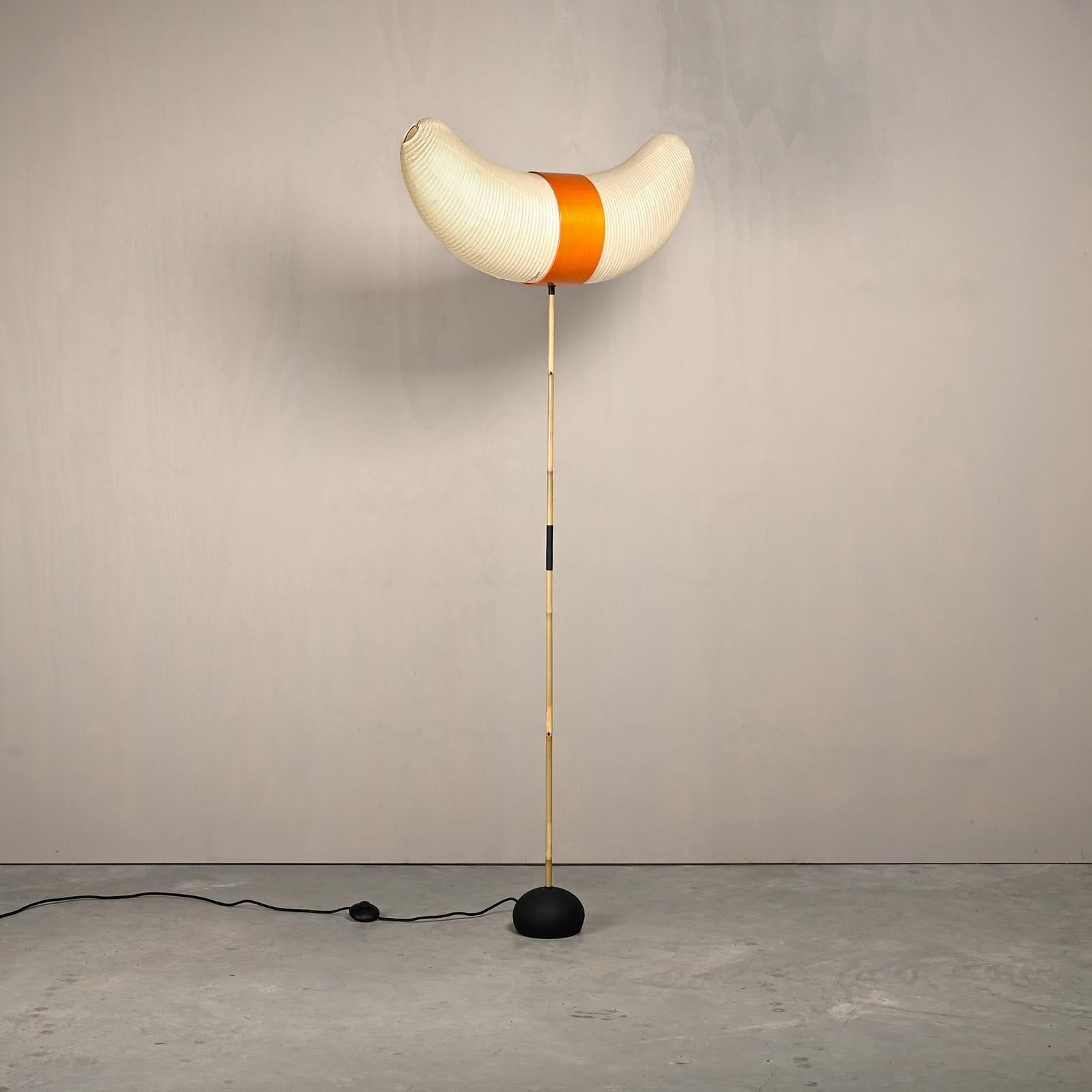 Iconic Akari Light Sculpture / Floor Lamp known as Model BB3-33S designed by Isamu Noguchi and handcrafted from traditional washi paper and bamboo. Very good / excellent original condition, signed by manufacturer stamp and suitable for US and EU