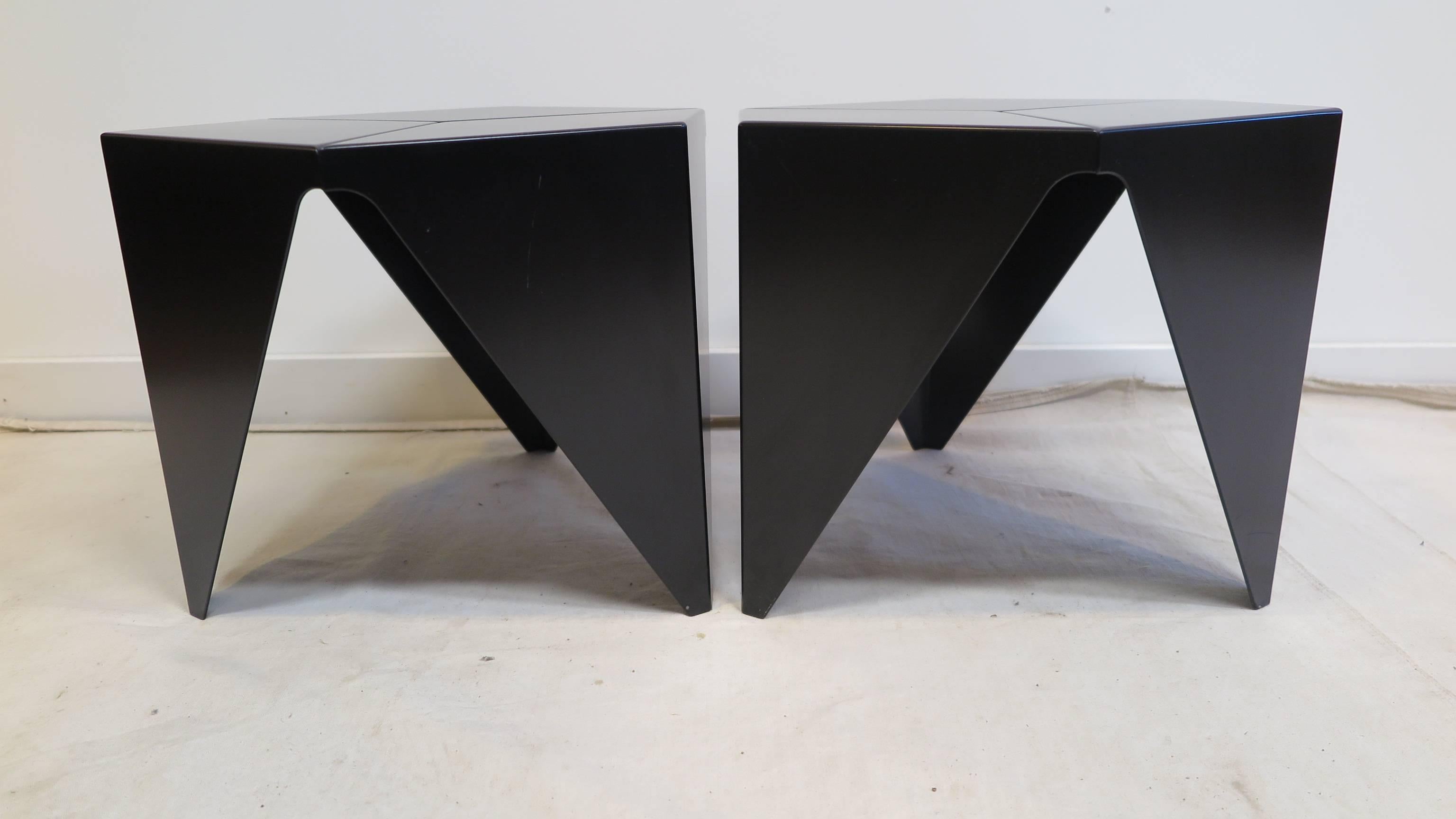 Isamu Noguchi prism tables originally designed in 1957, these being authorized reedtion's dated 2002. In very good condition light surface ware. Powder coated Aluminium. Priced individually at $550.00 each, pair available. 

Noguchi table, side