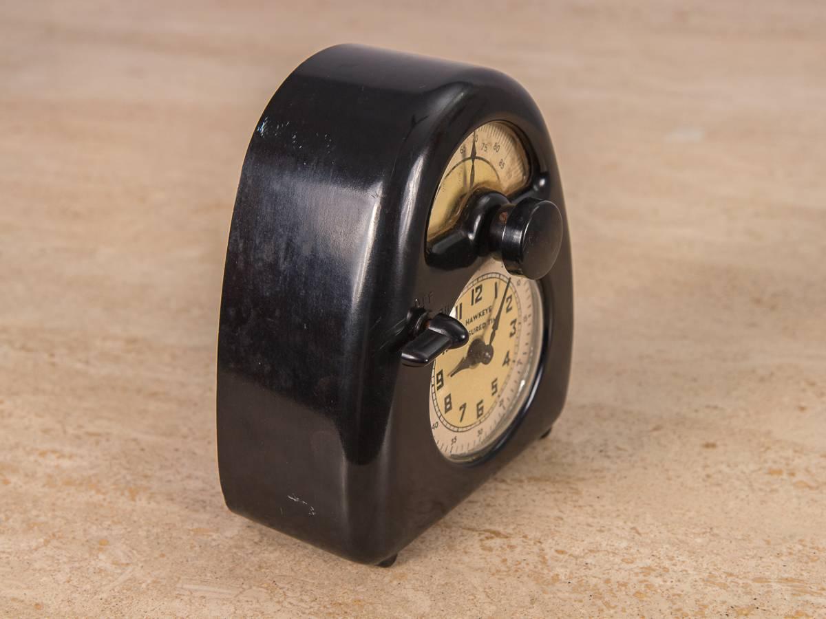 Isamu Noguchi’s first mass-produced design. The clock showcases the inception of Industrial materials, and was an early artifact in Noguchi’s design métier. The original bakelite exterior is in good condition, and the clock face is very clean. Works