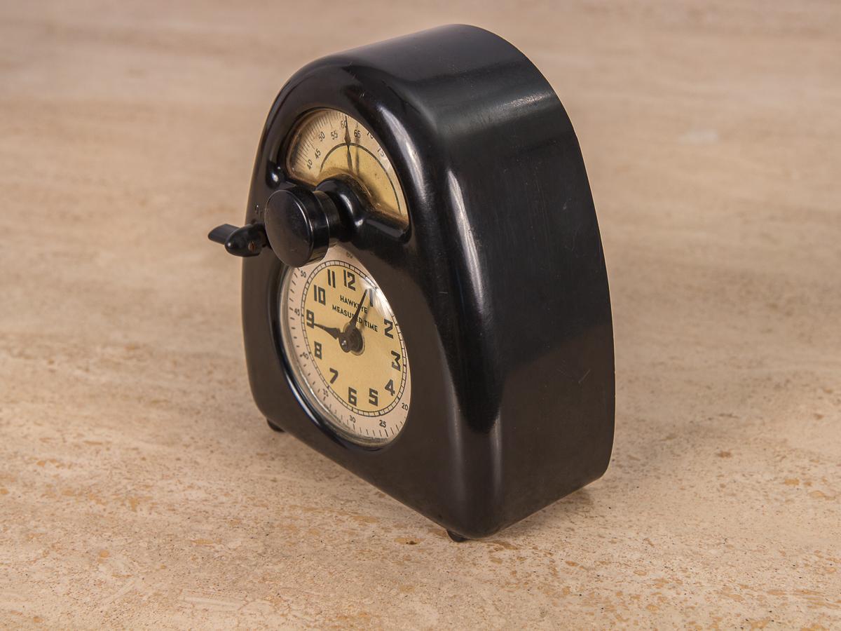 Isamu Noguchi’s first mass-produced design. The clock showcases the inception of industrial materials, and was an early artifact of Noguchi’s design métier. Original bakelite exterior has age appropriate wear with a hairline crack on the left side.