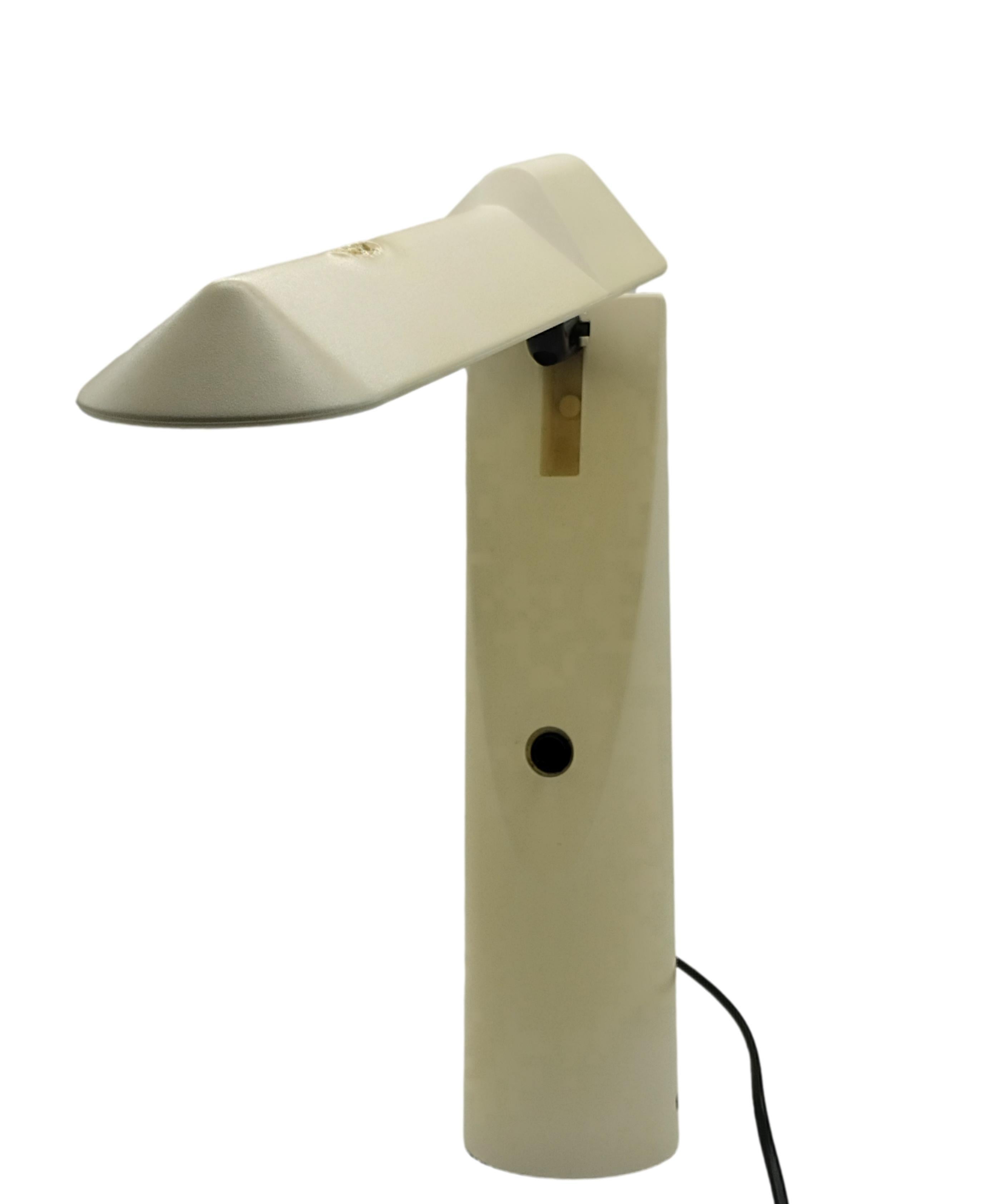 
Picchio table lamp by Japanese designer Isao Hosoe and produced by Luxo Italiana in 1984.
Elegant and functional table lamp made of ABS.
 The top of the Picchio lamp is fully adjustable, encloses an aluminum reflector, and is arranged to hold a